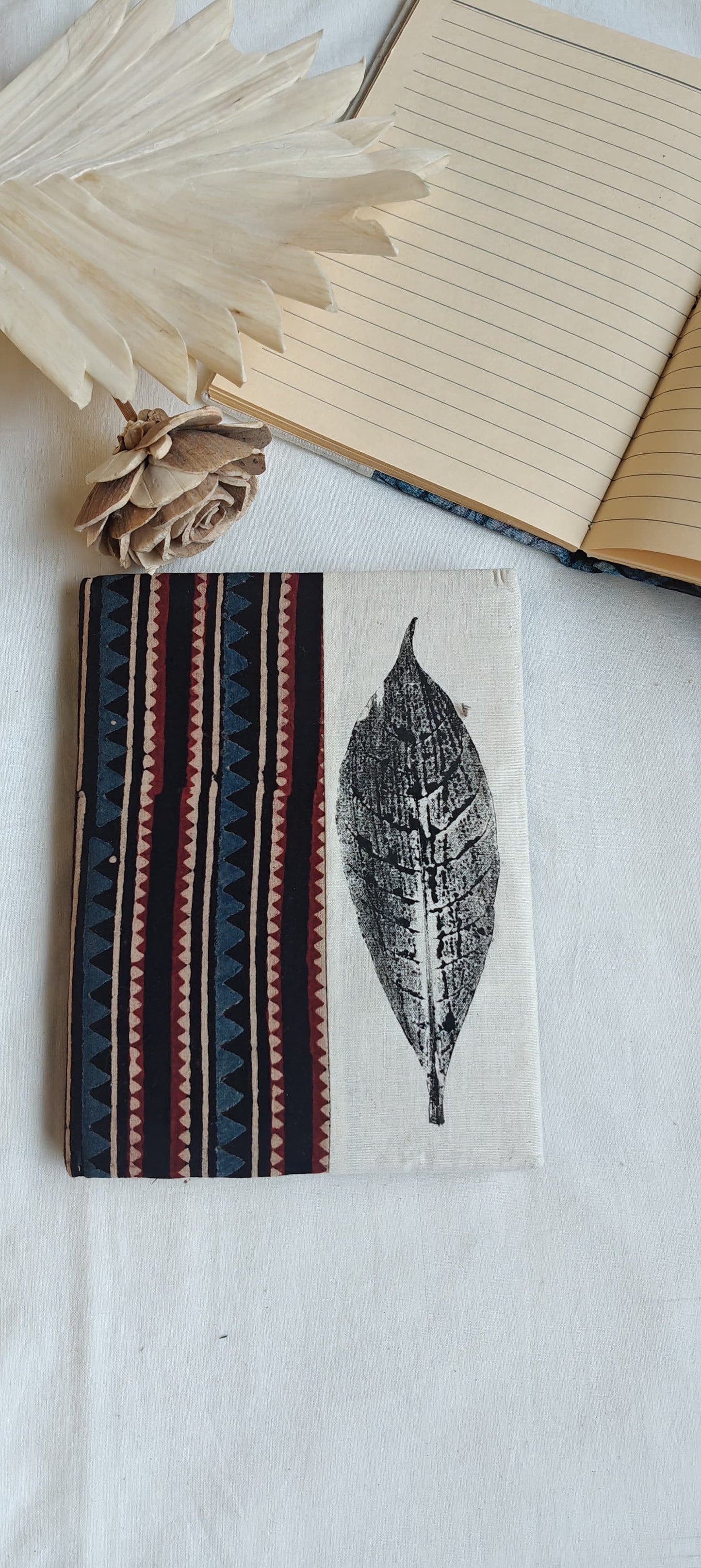 Handmade paper notebooks with hand eco printed fabric cover