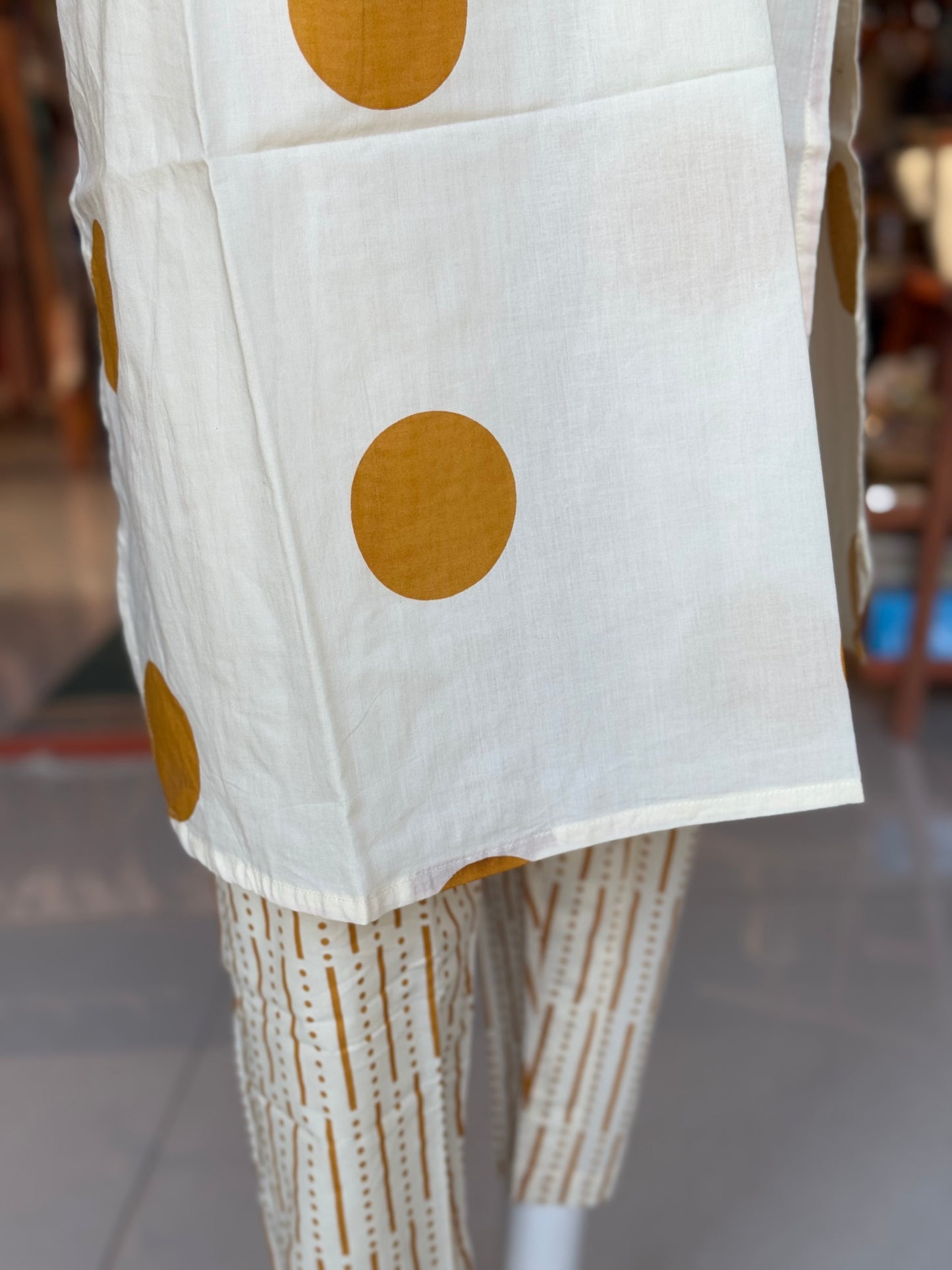 Cream and rust orange cotton full sleeves, front pleated straight kurti, pants - 2 piece set