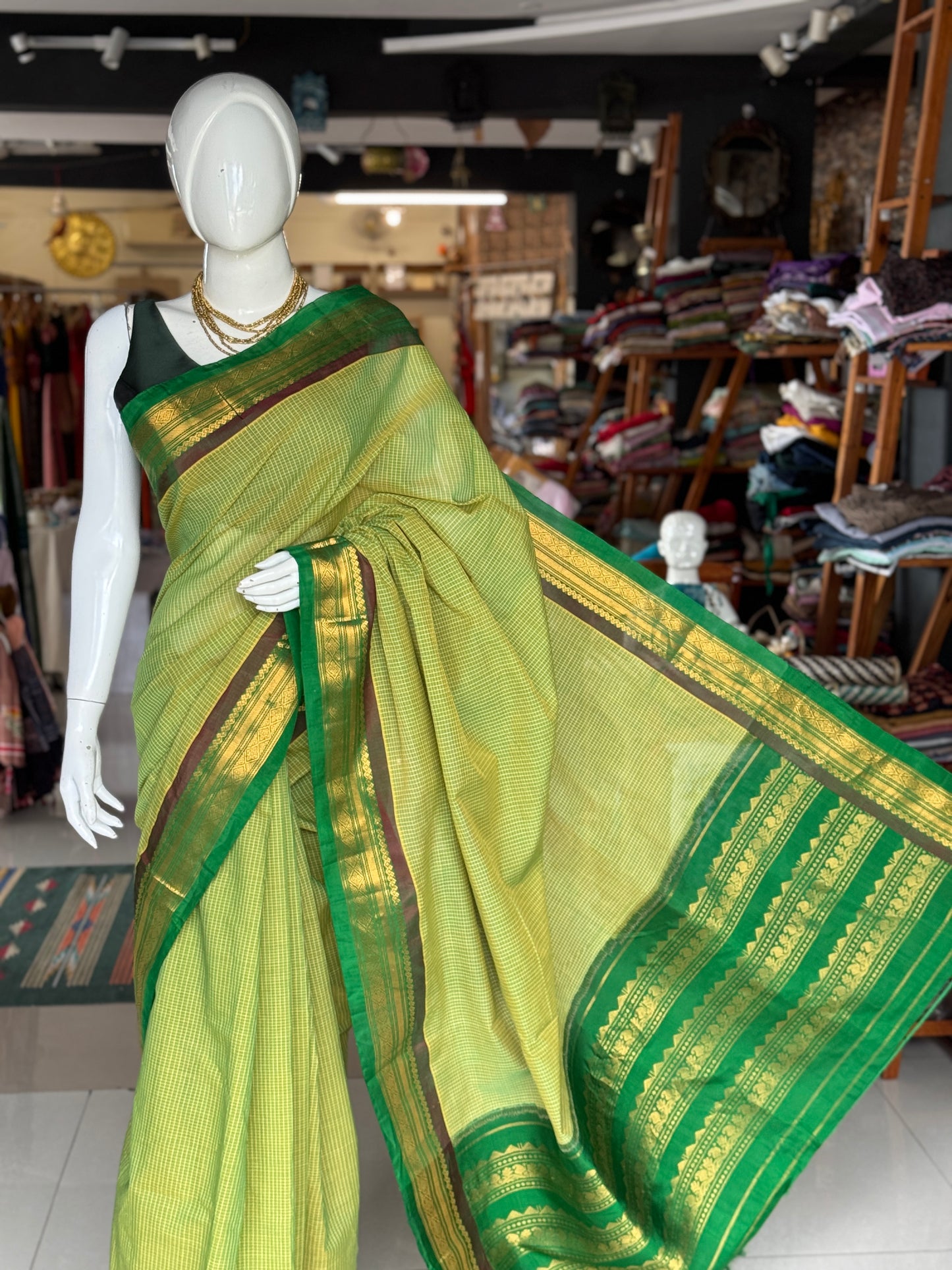 Gadwal cottons - green handwoven Gadwal cotton saree with silk Pallu and borders
