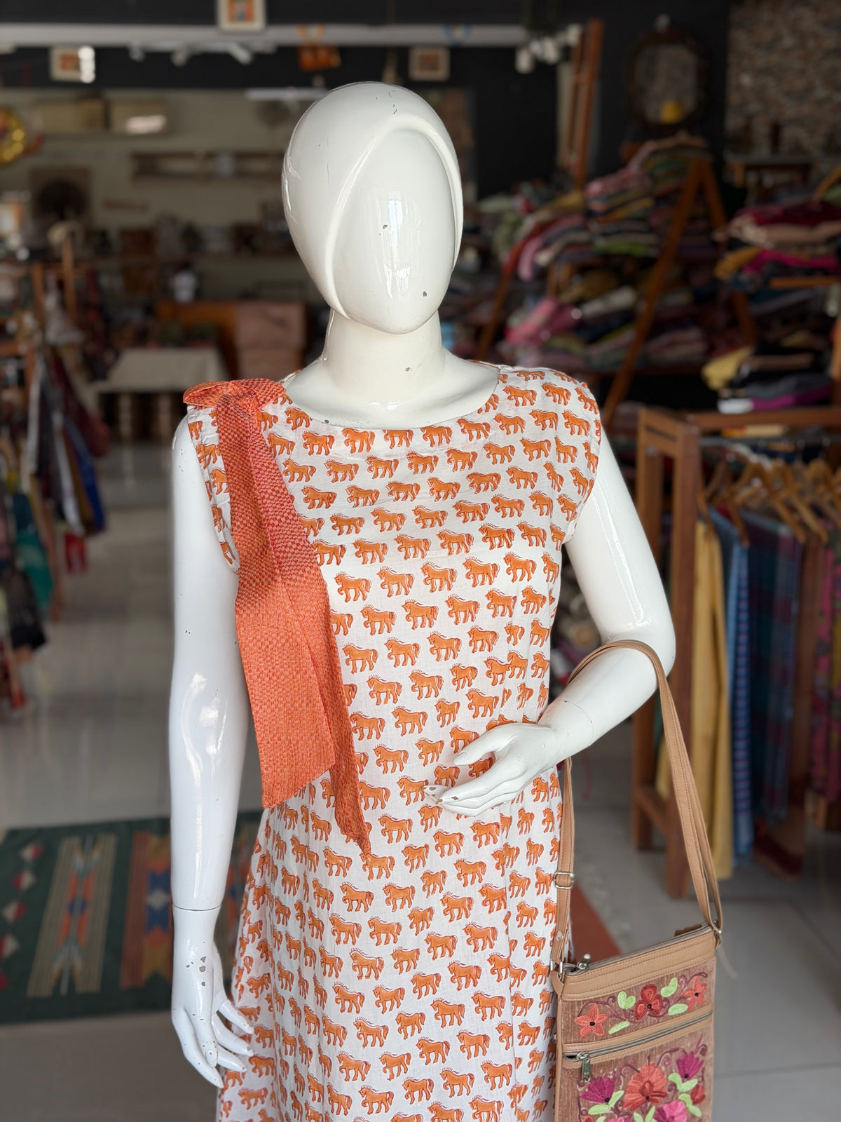 White n Orange cotton dress with horses hand block prints and handwoven 4 pedal weave trims