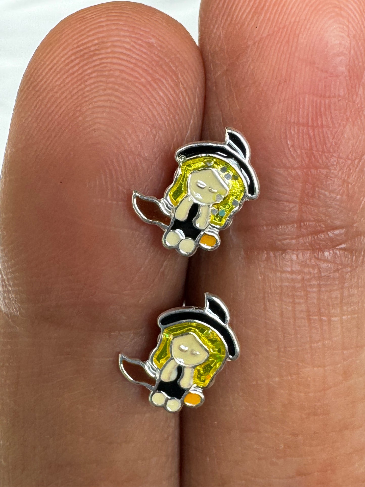 Tiny pure silver studs in cute designs for children