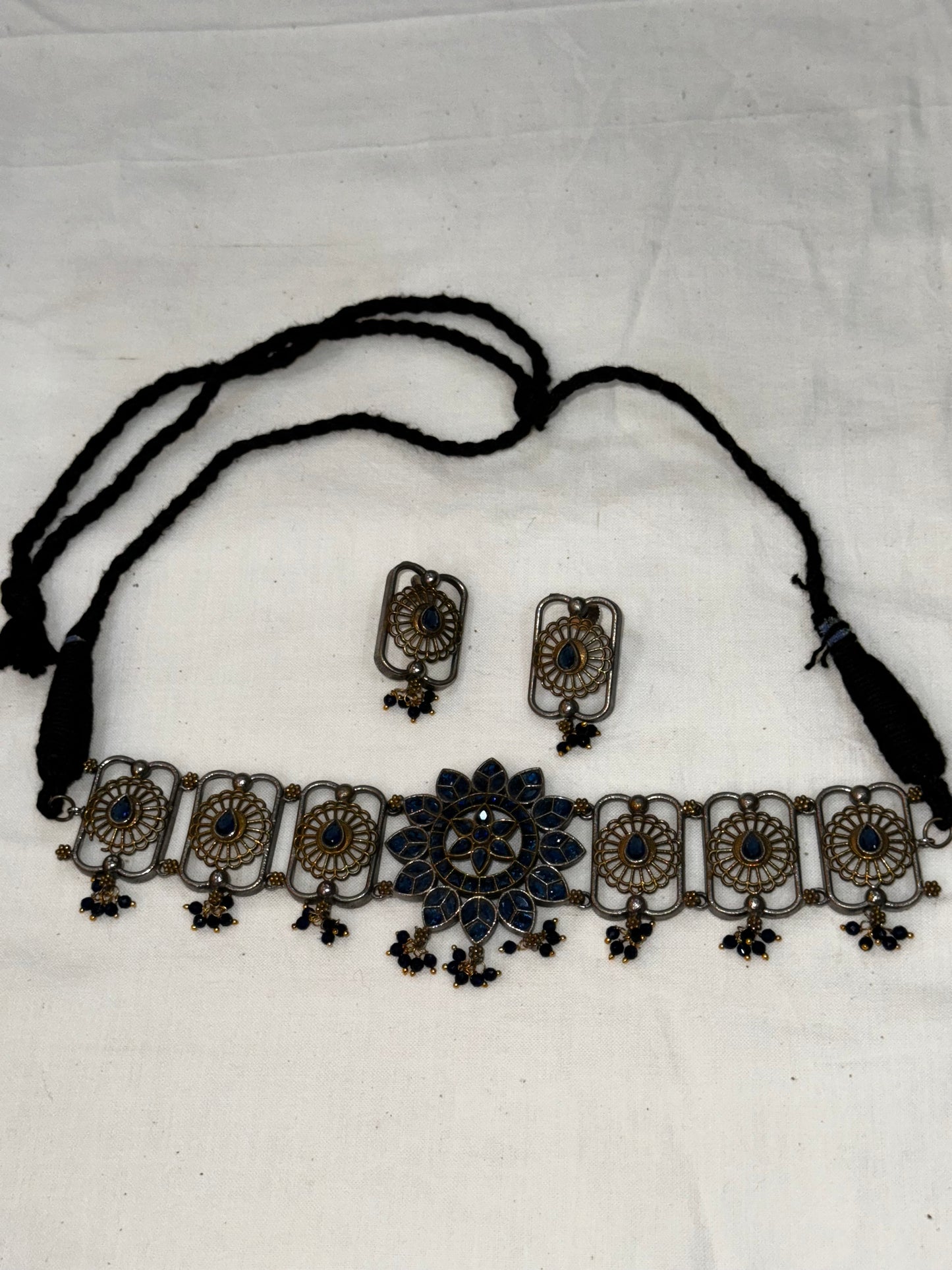 Blue stones choker and earrings set in gold silver dual tone