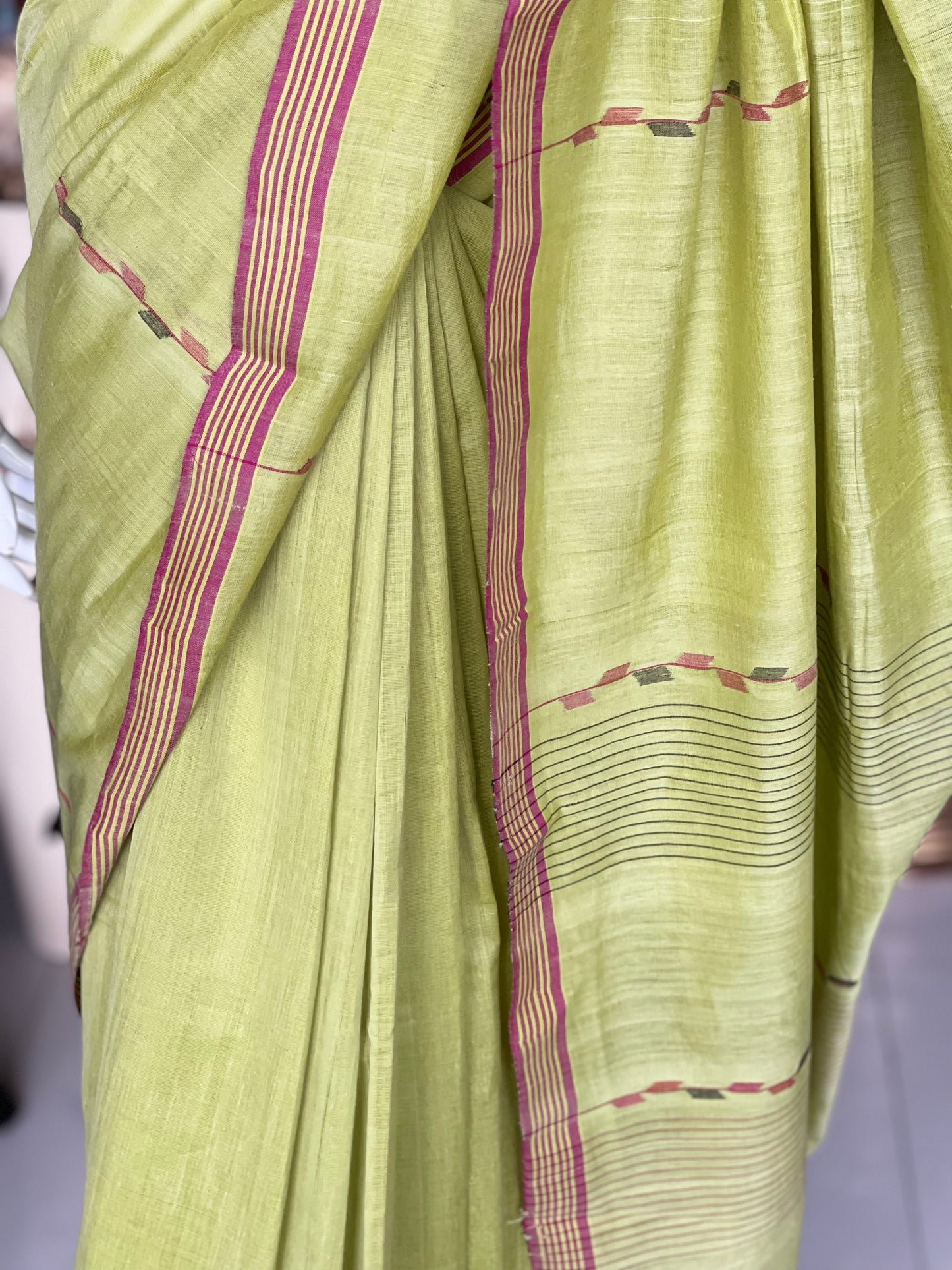 Green hand spun hand woven cotton saree with stripes border