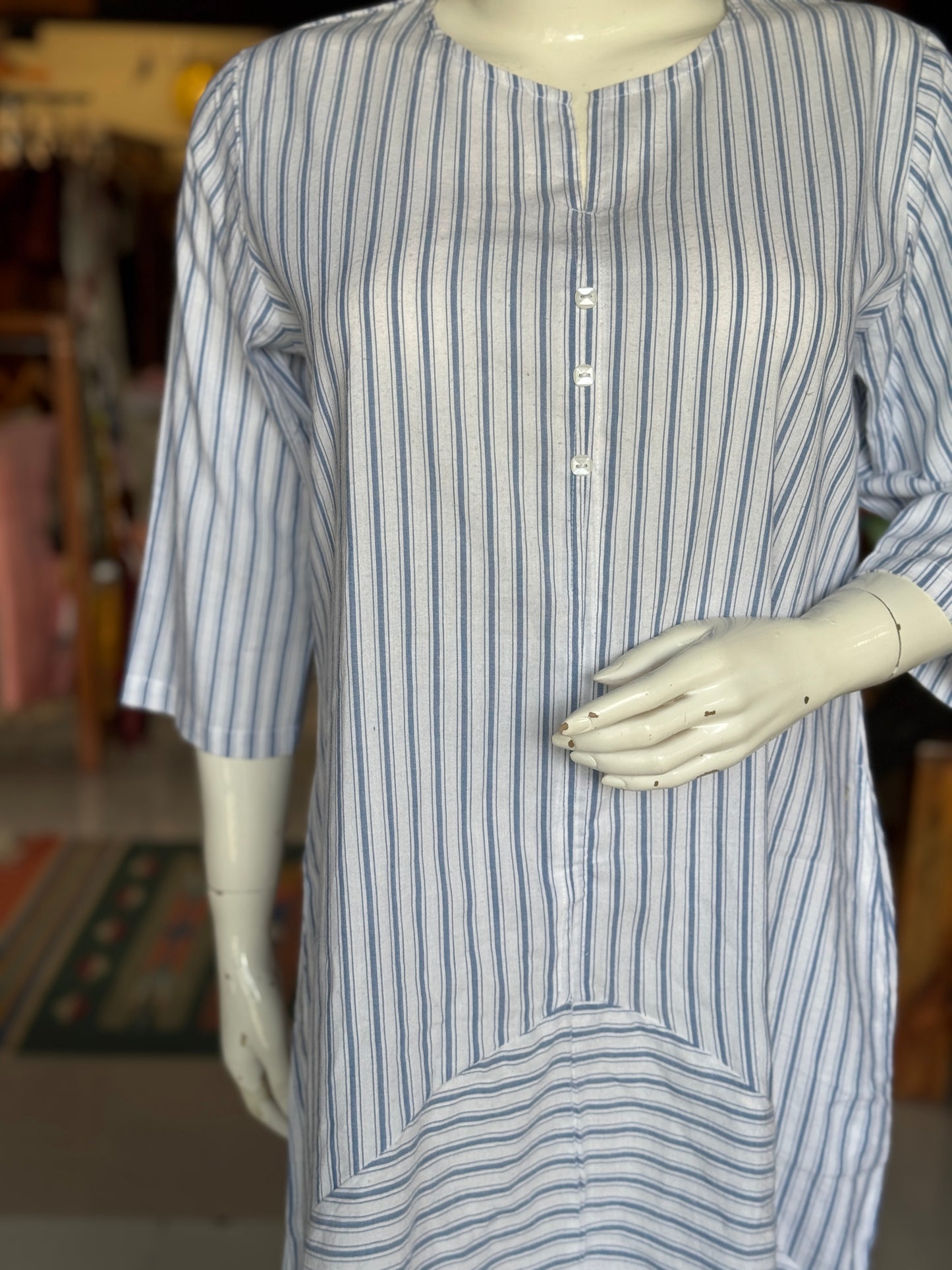 White n blue stripes dress with horizontal and vertical stripes