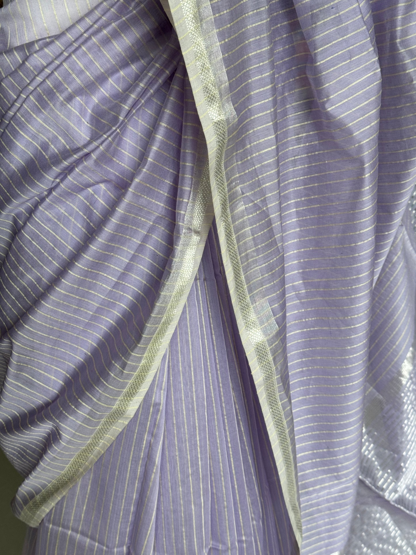 Lavender silk cotton Maheshwari handloom saree with silver zari pallu and vertical stripes all over