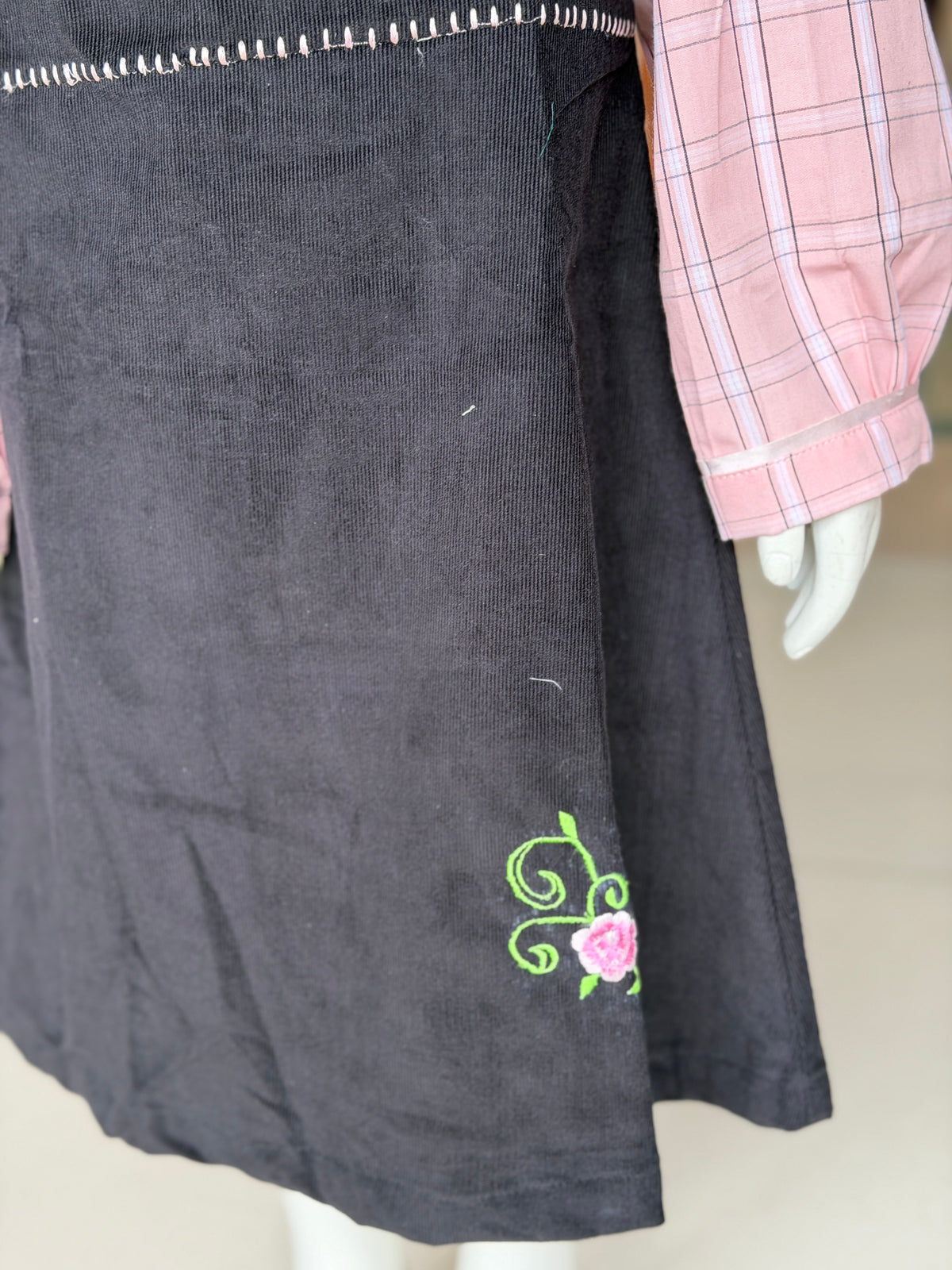 Black corduroy pinafore dress with pink checks collared shirt for girls
