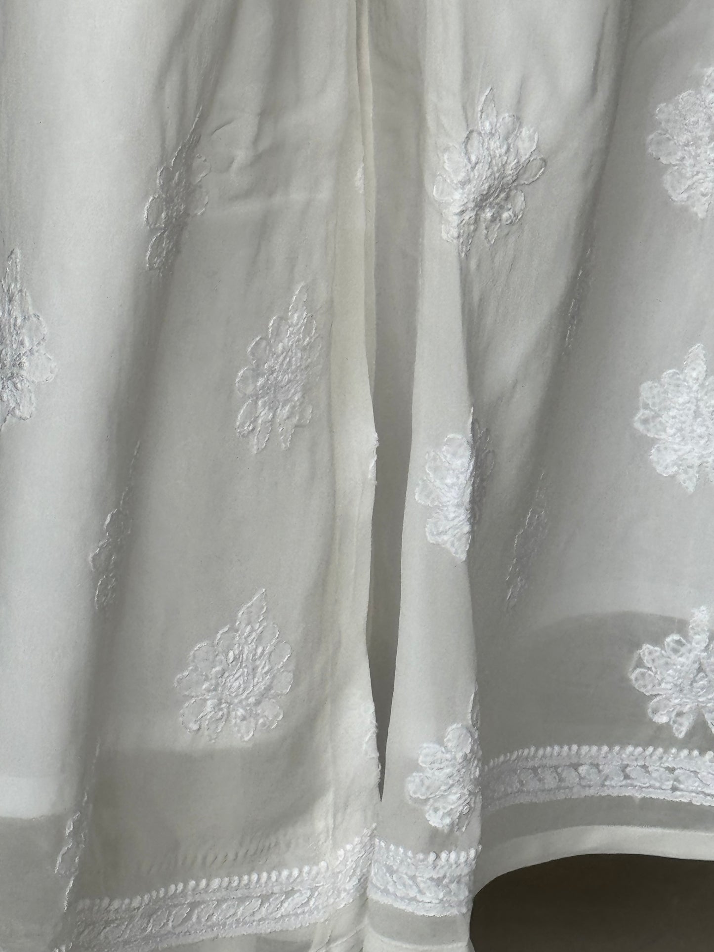 White viscose georgette free size plazo pants with chikankari hand embroidery