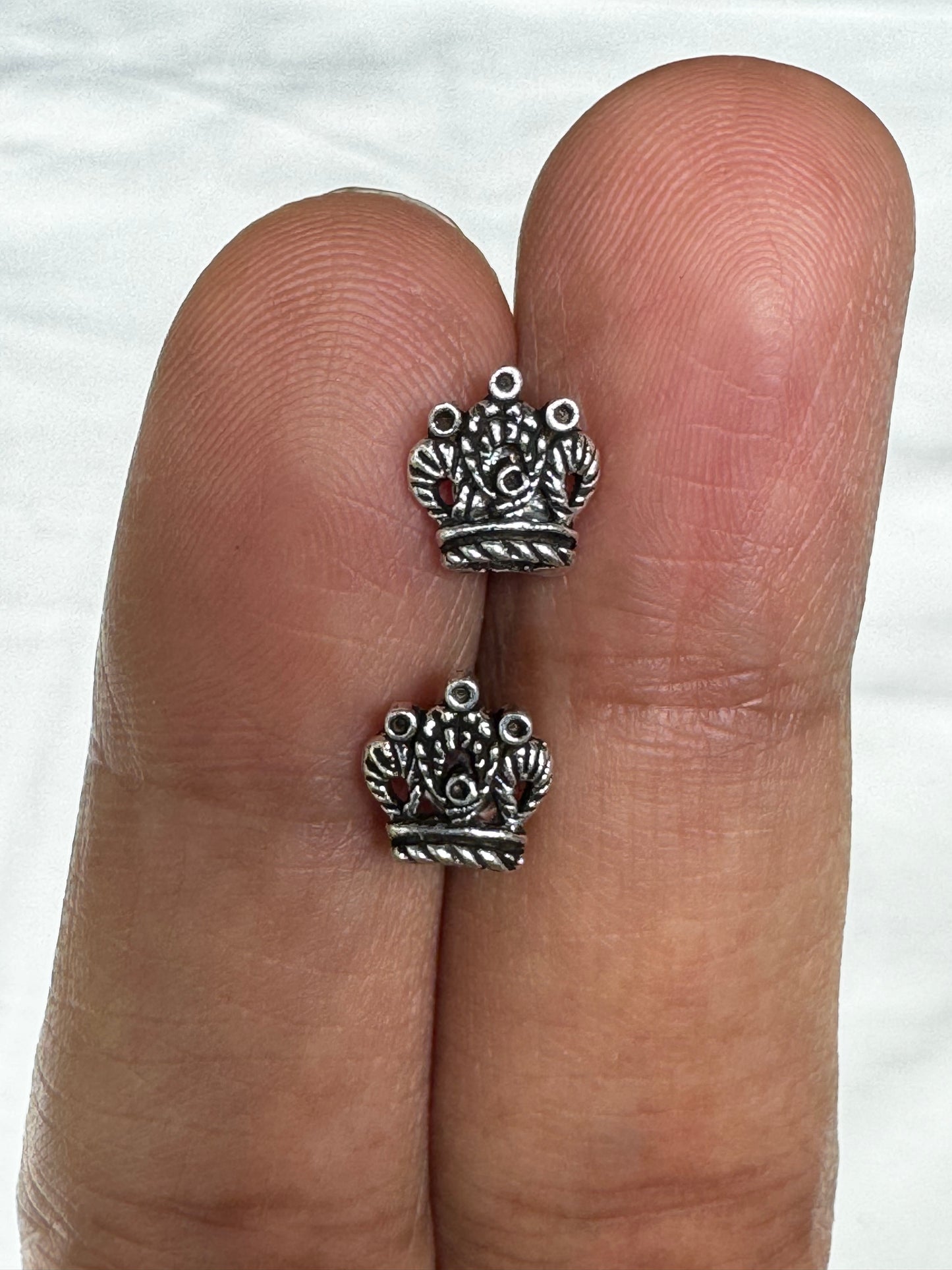 Tiny pure silver studs in cute designs for children