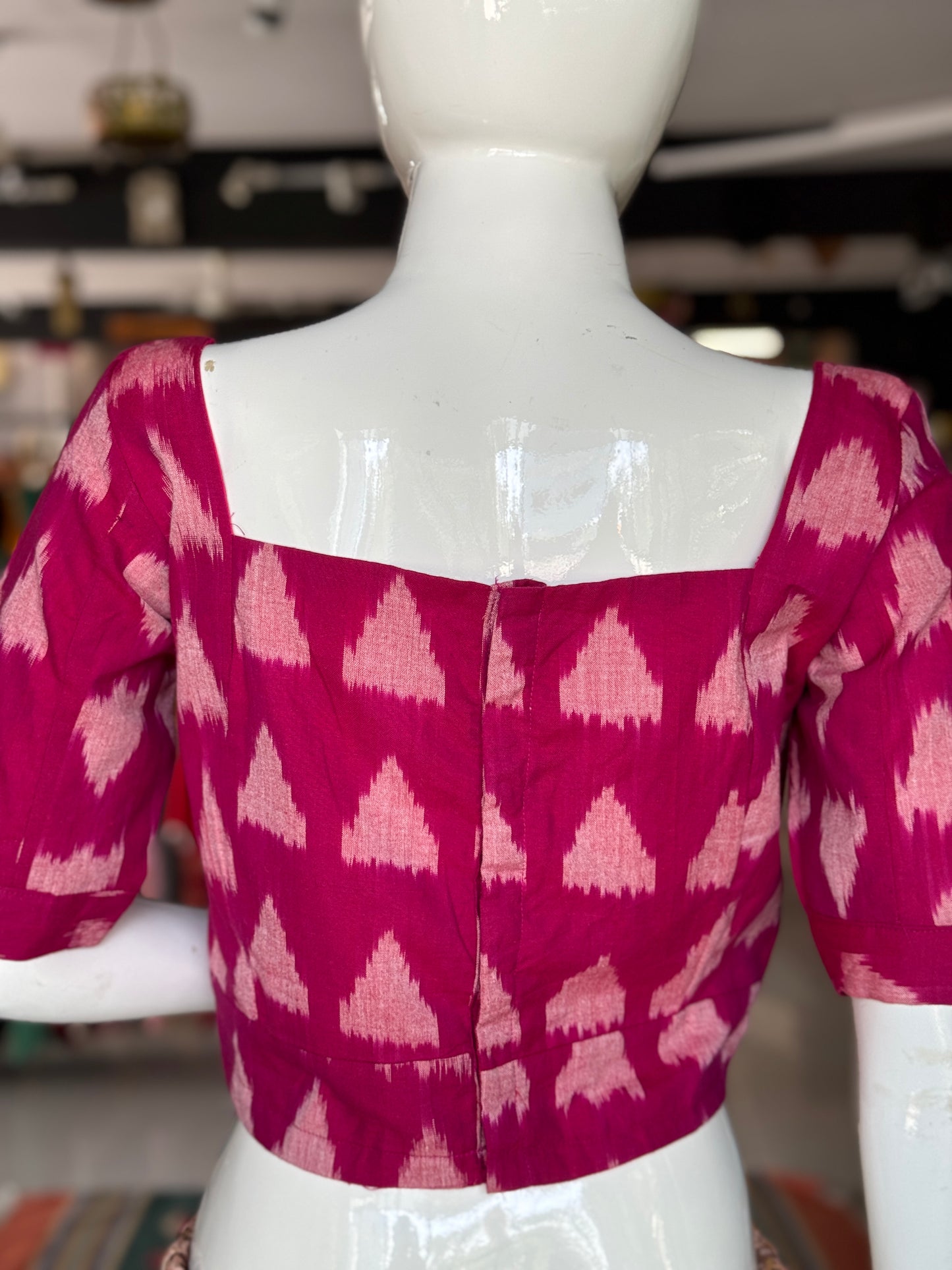 Dark pink triangular design cotton fancy ikat blouse