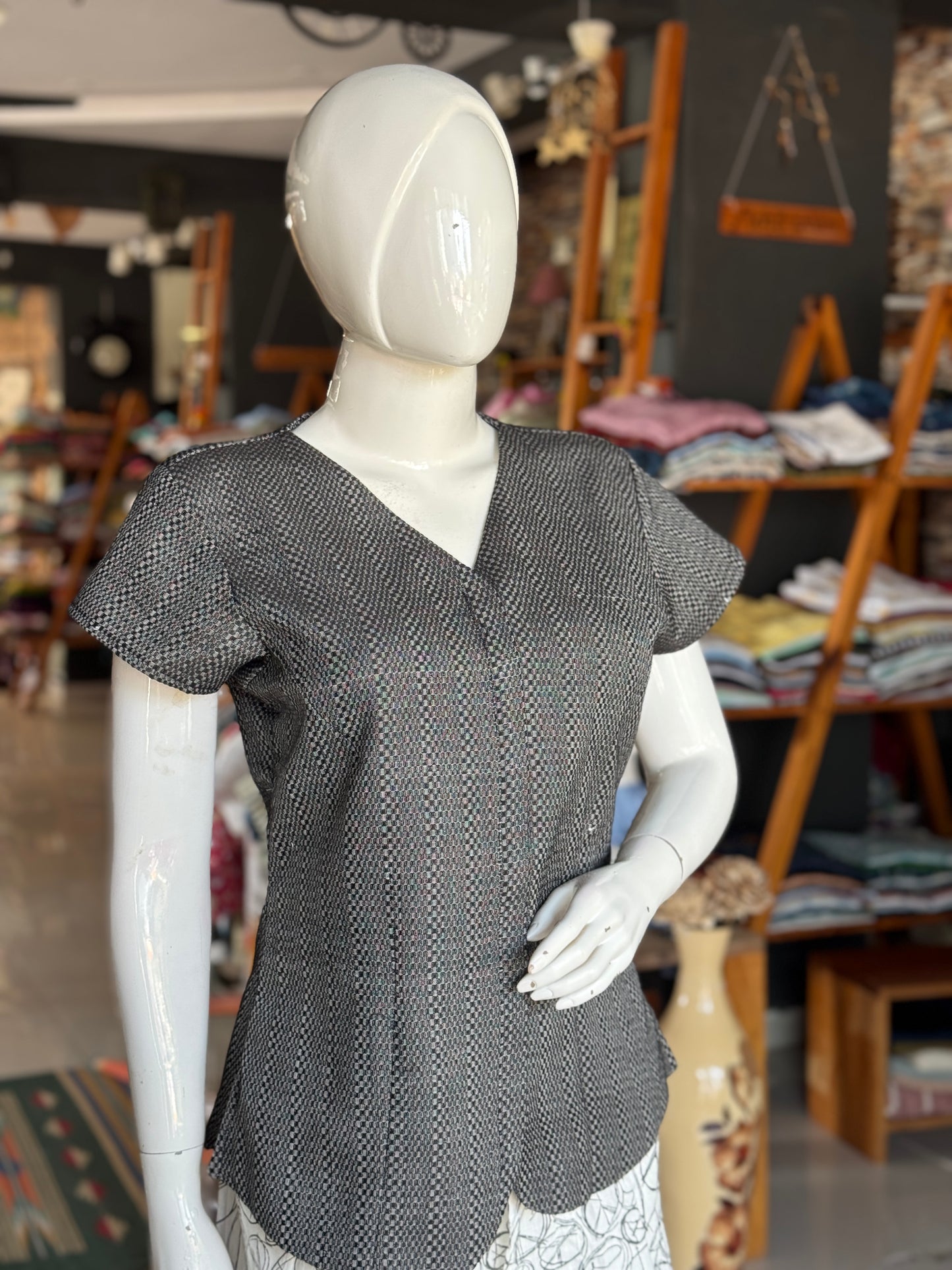 Black textured handwoven cotton top - V neck with curved hemline