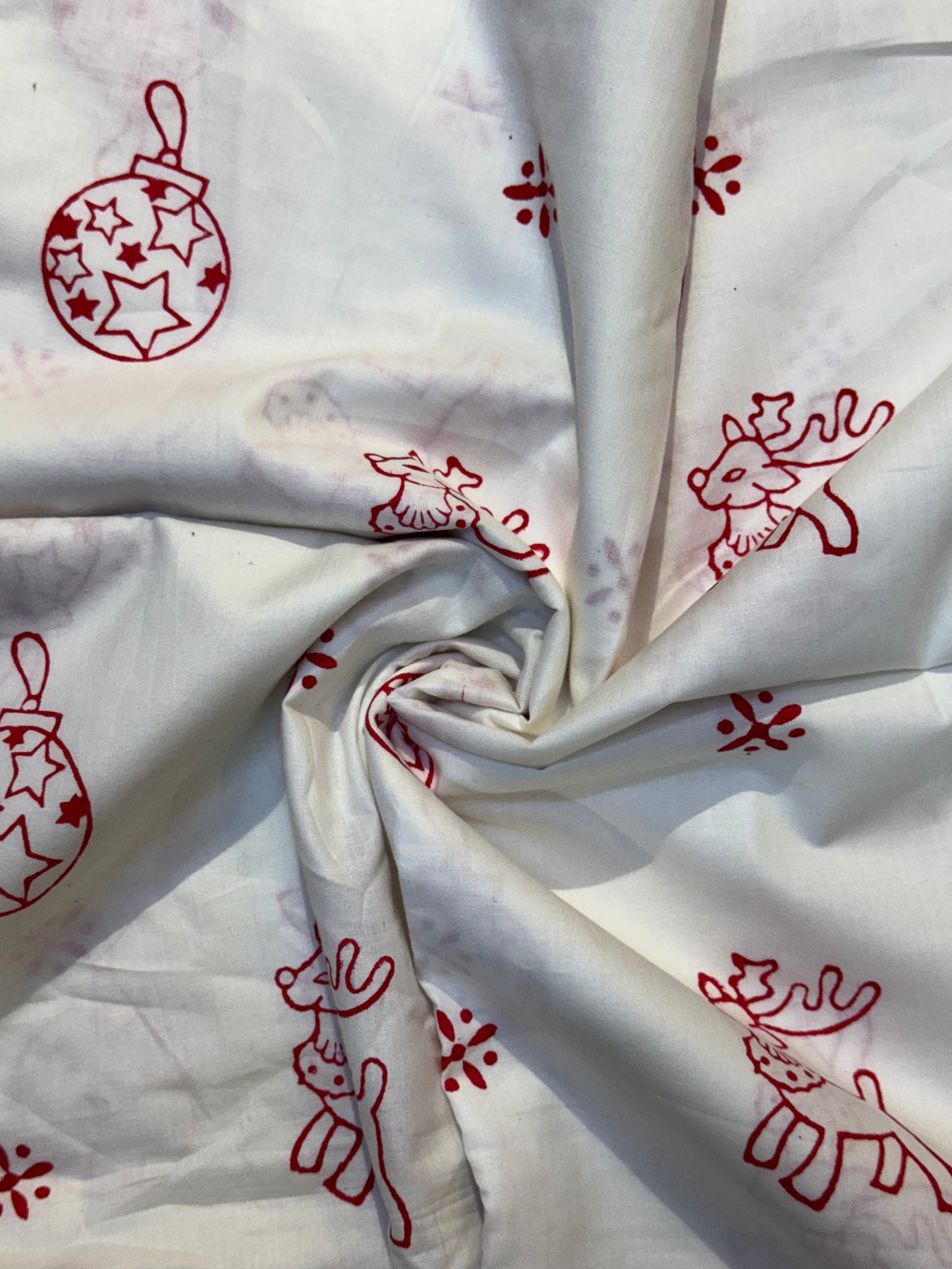 Christmas themed white hand block printed cotton fabric
