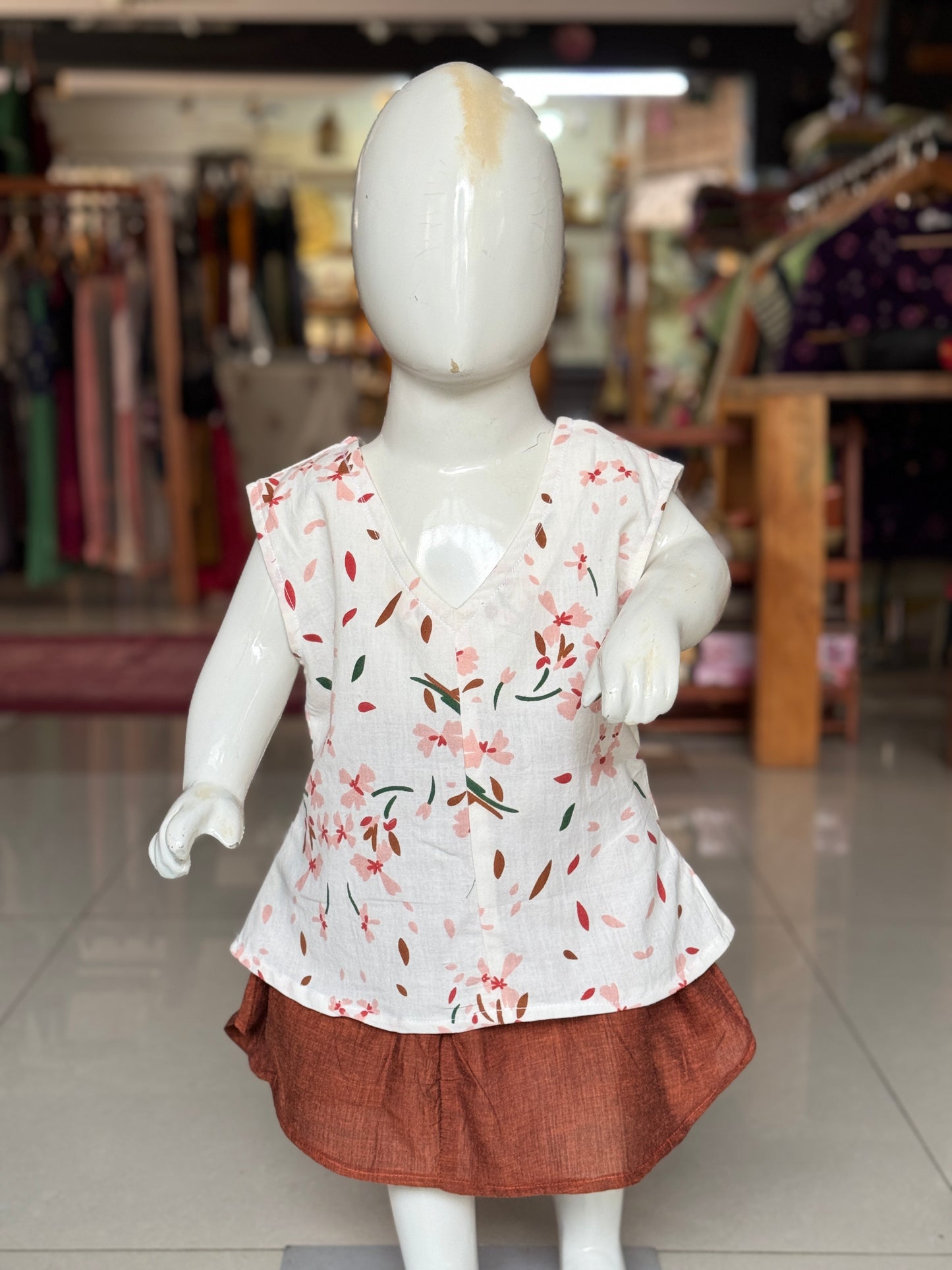 Floral brown print on off white soft cotton handloom top for girls