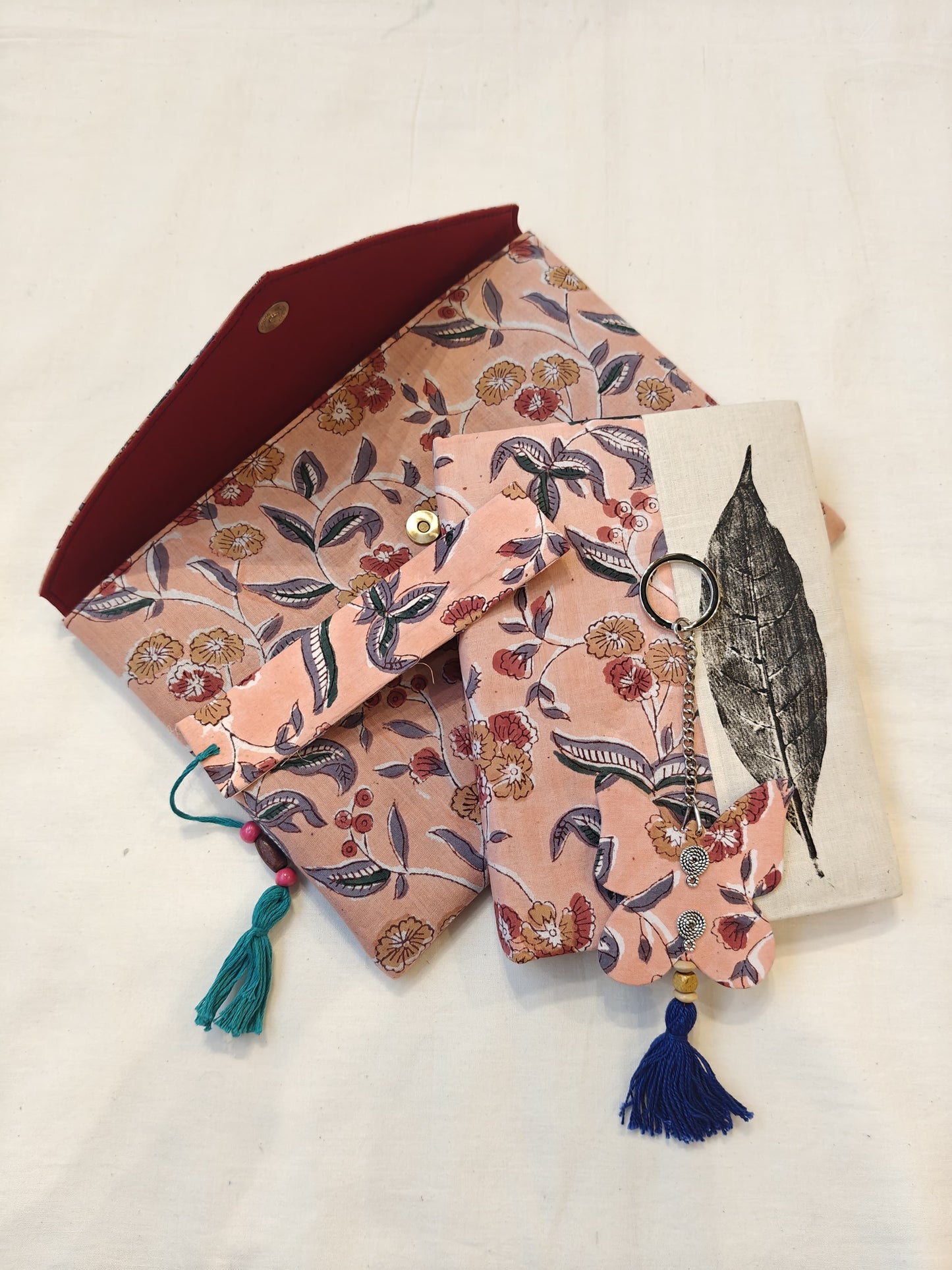 Handmade paper notebook with eco leaf printed fabric cover, hand crafted bookmark, key ring / charm and a container pouch set
