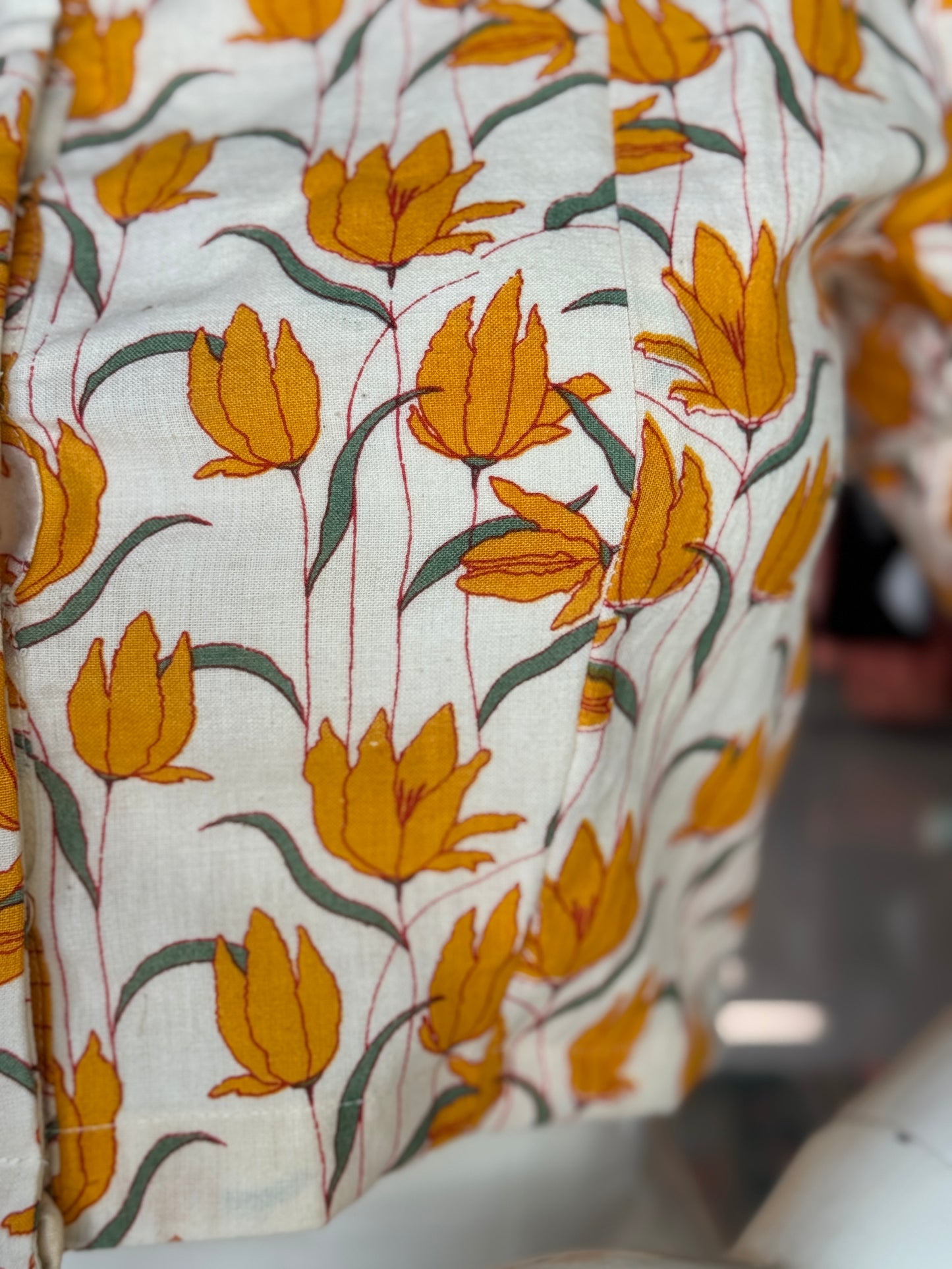 Offwhite handwoven cotton front open blouse with mustard yellow flowers