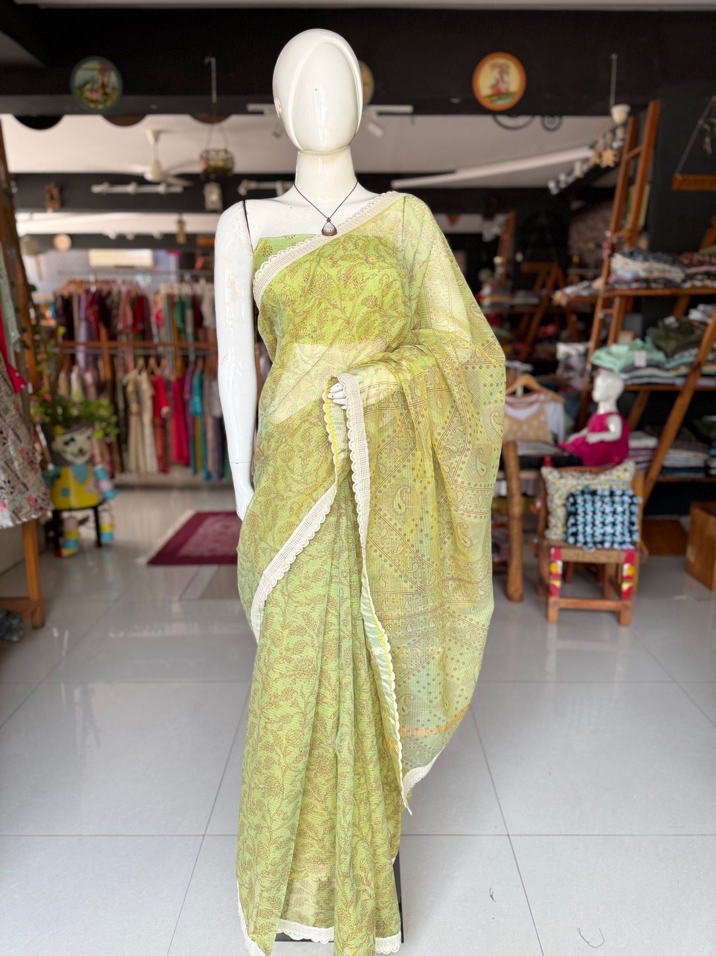 Fine floral print kota saree with scallop lace border