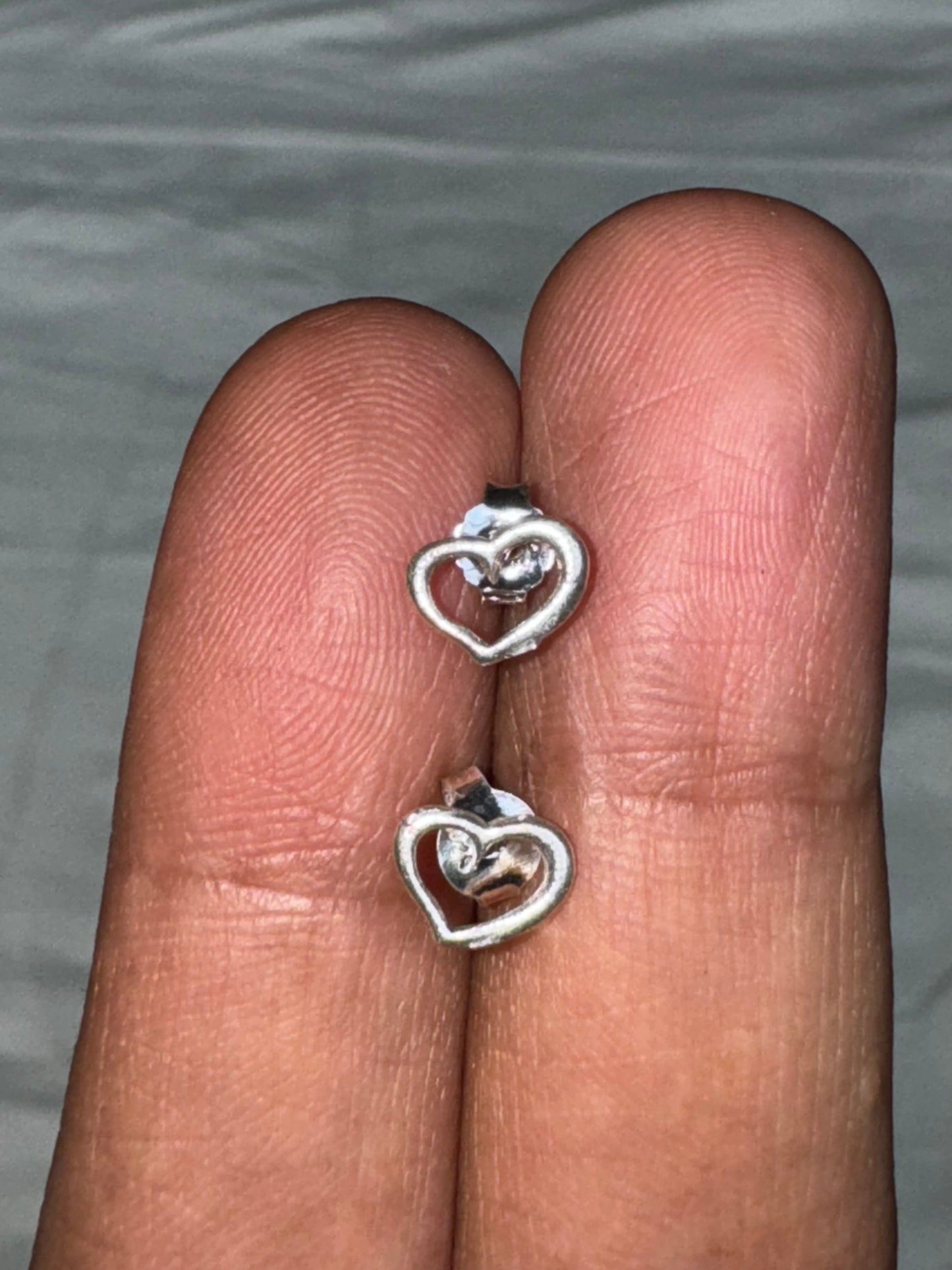 Tiny pure silver studs in cute designs for children