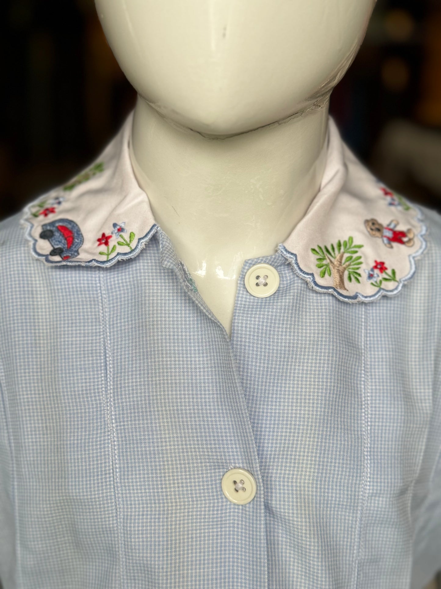 Light blue checks box pleated frock with embroidered collar