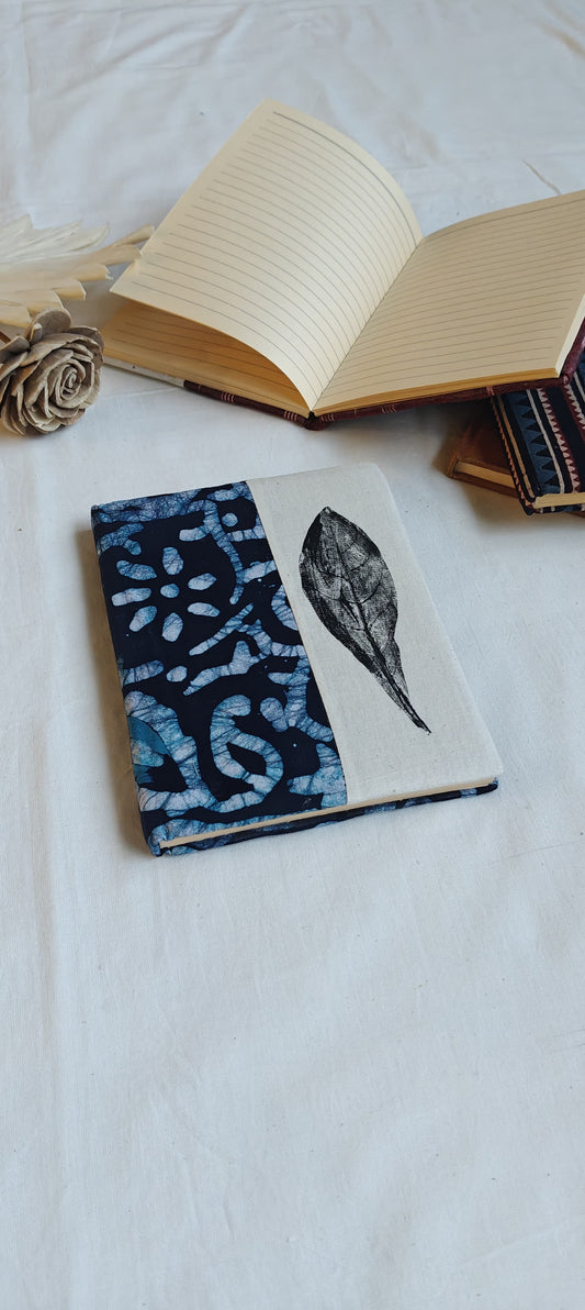 Handmade paper notebooks with hand eco printed fabric cover