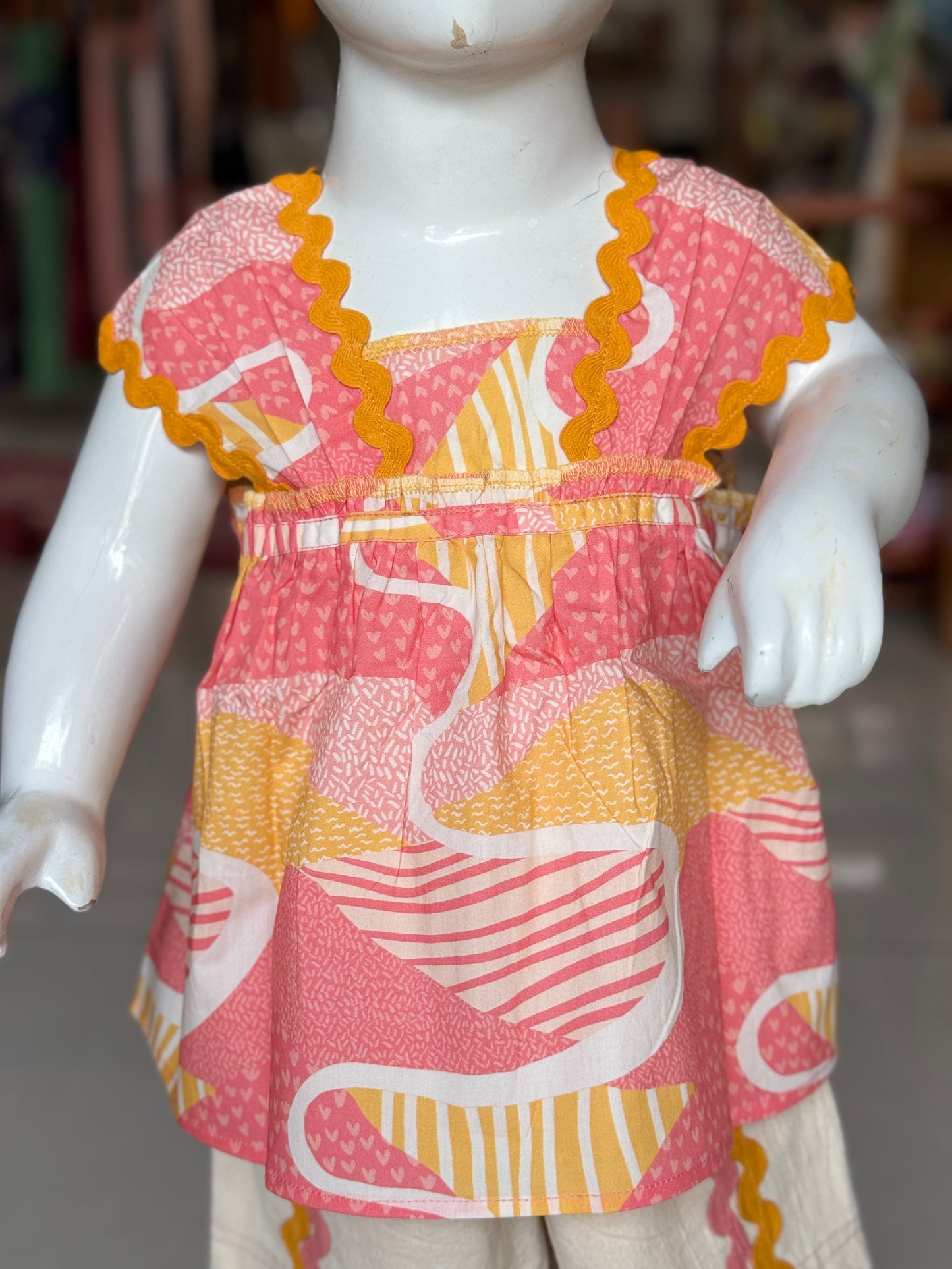 Pink and yellow cotton digital printed tunic top with wavy lace shorts in cotton