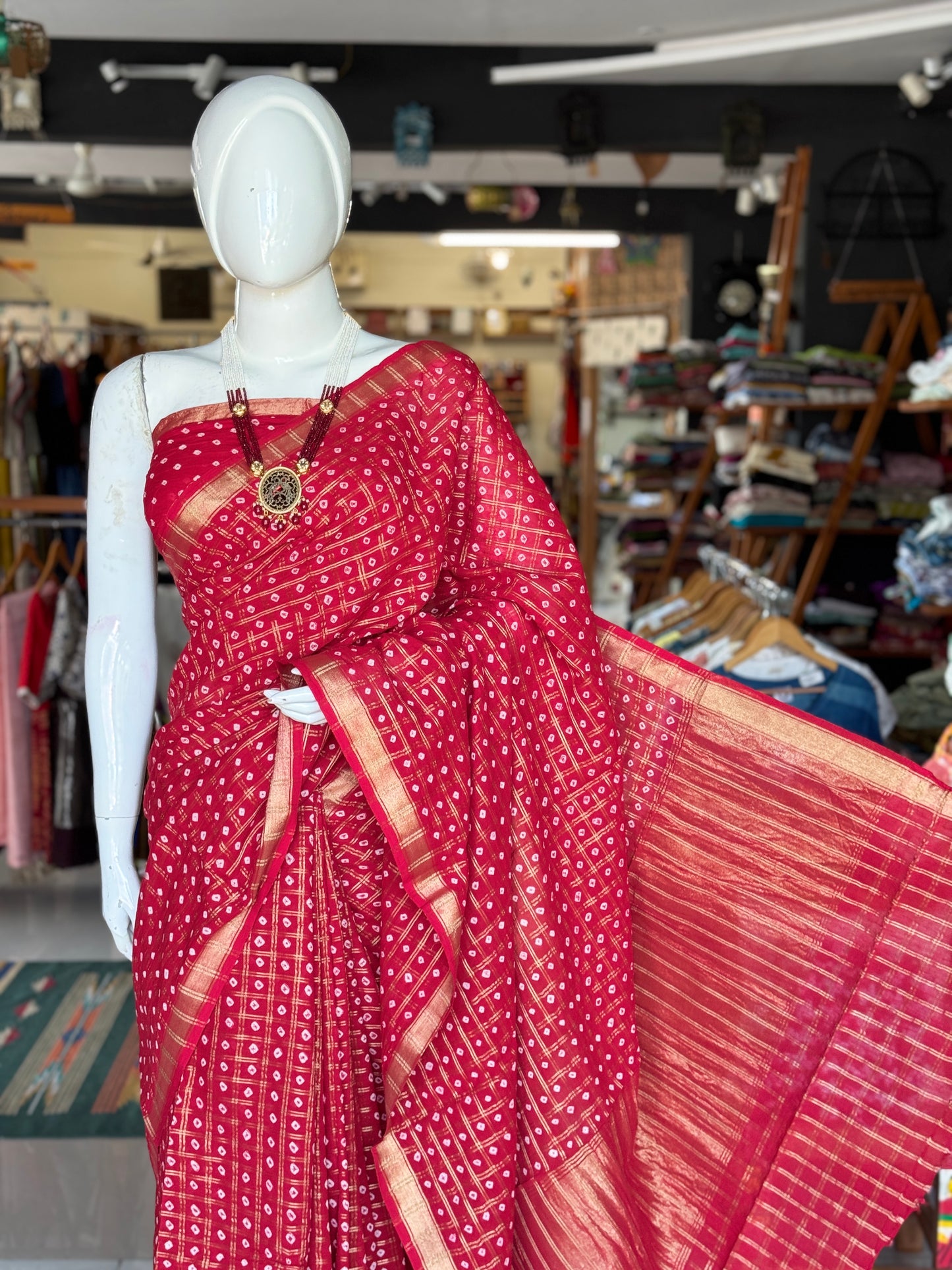 Reddish maroon gharchola bandini tie n dye cotton saree with zari checks
