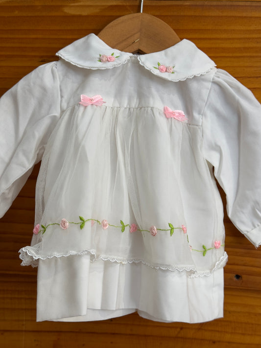 White peter pen collared cotton baby frock with cute embroidery and net layer on top