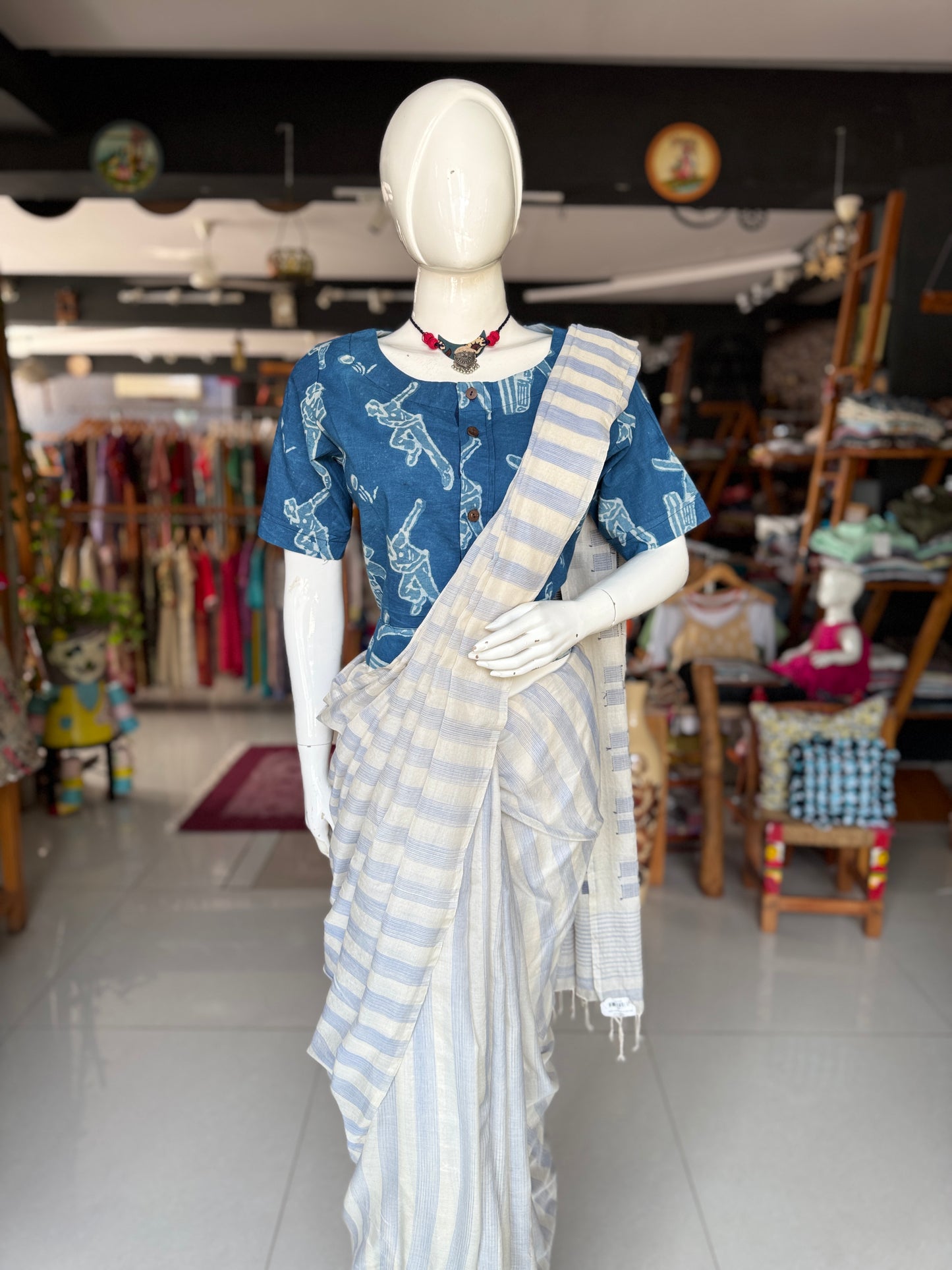 Off white handloom cotton saree with stripes body