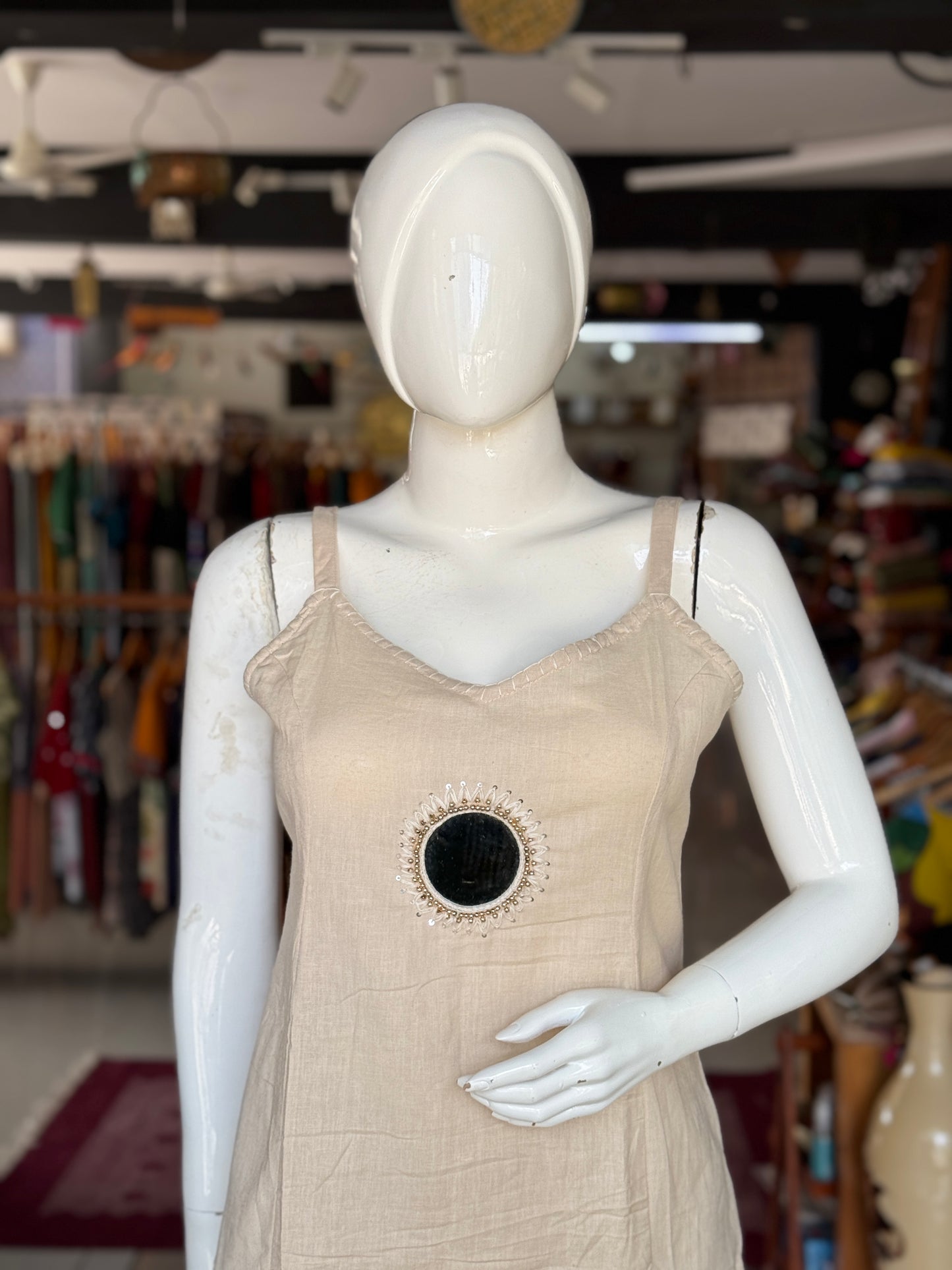 Plain flex cotton sleeveless Kurti with mirror embroidery, blanket stitch embroidery and flared palazo pants - 2 piece set