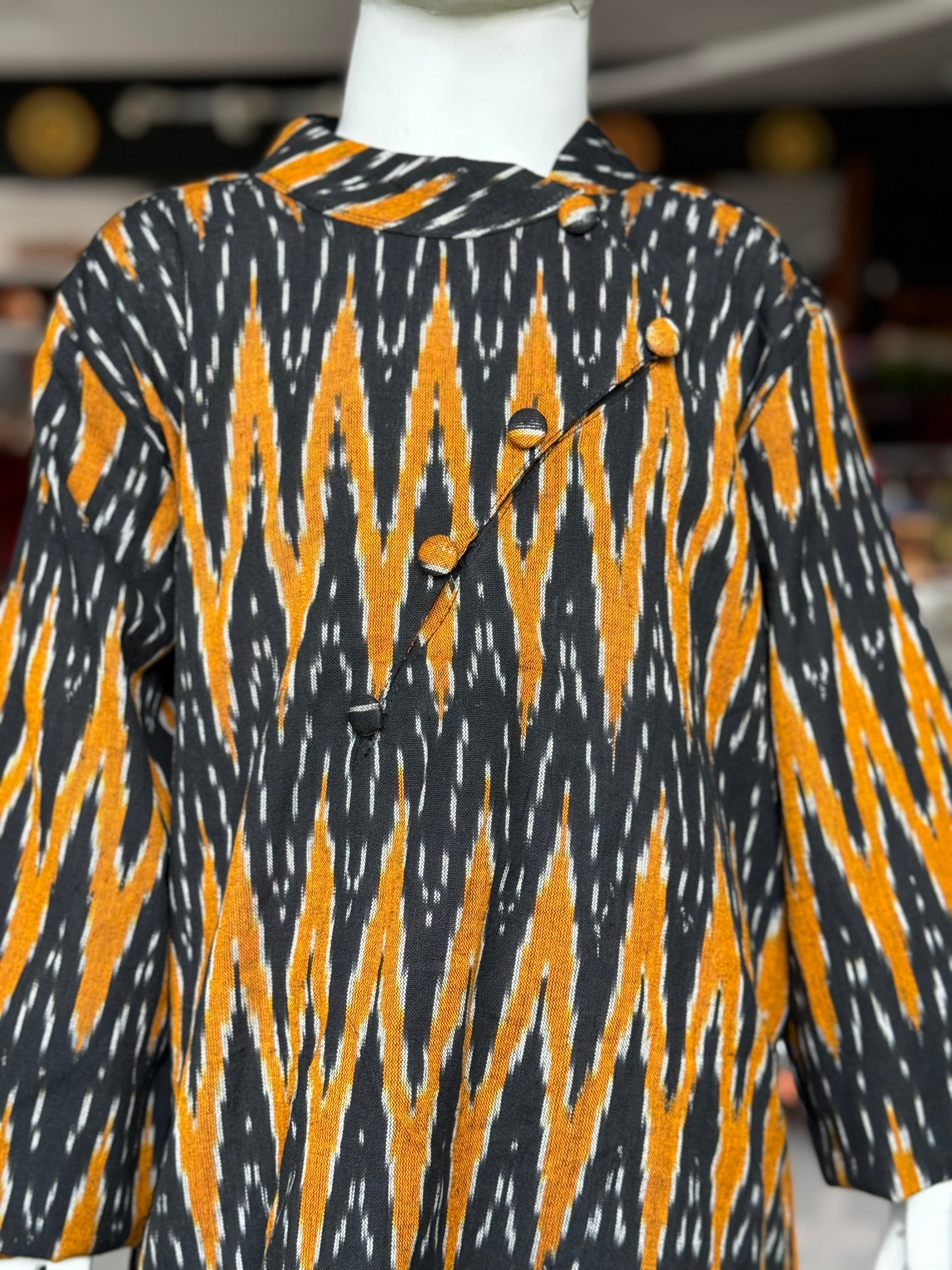 Black and mustard ikat cotton kurta for boys with asymmetric buttons