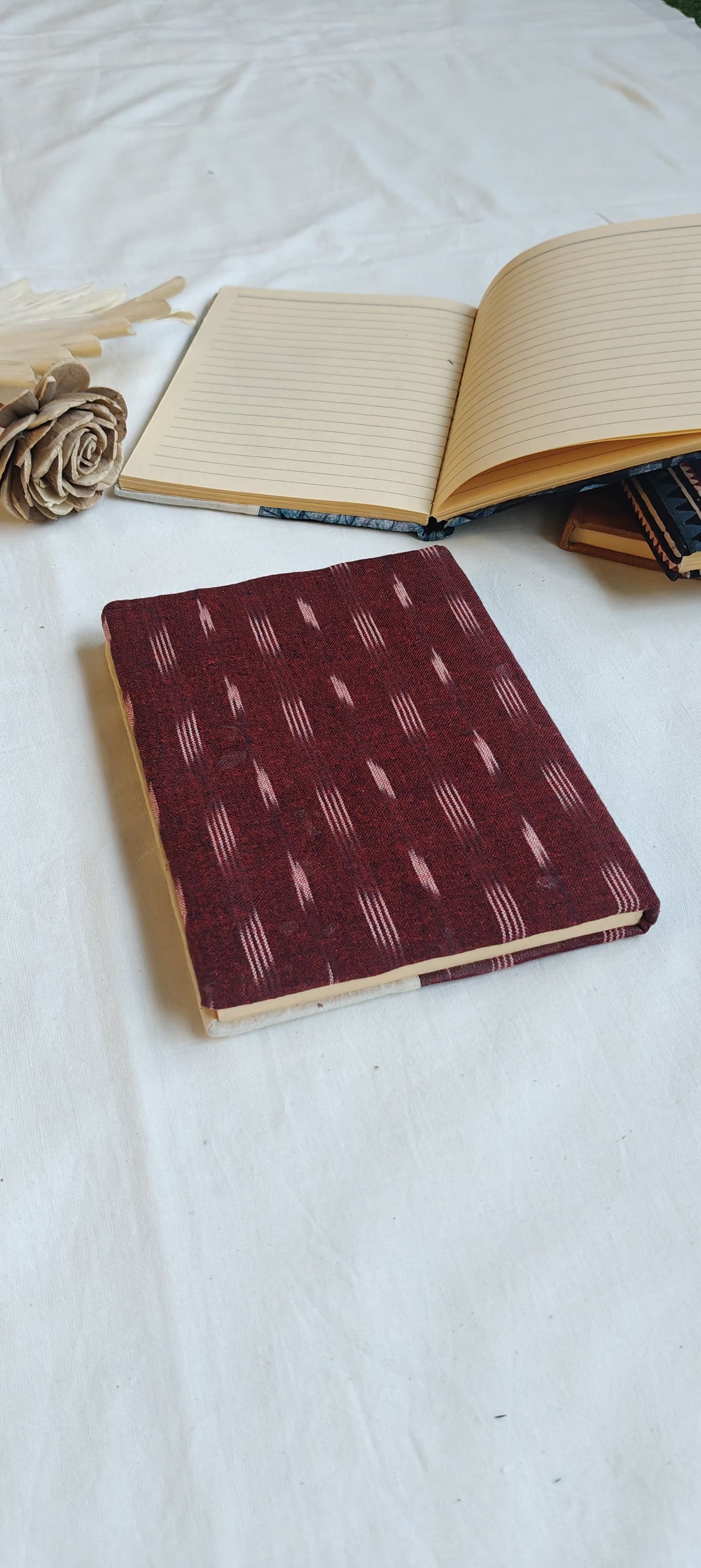 Handmade paper notebooks with hand eco printed fabric cover