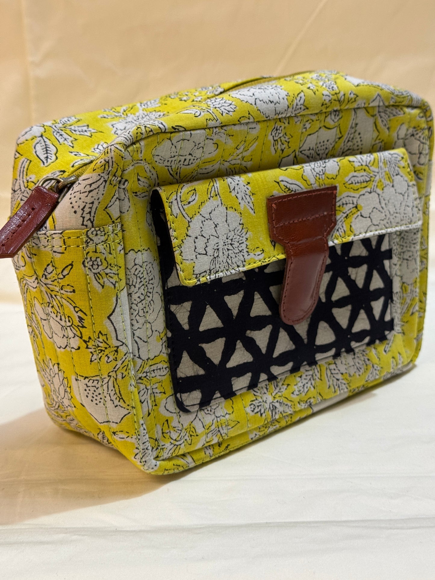 Handcrafted toiletries / travel pouch with leak proof plastic lining plus colorful front pocket with leather patch