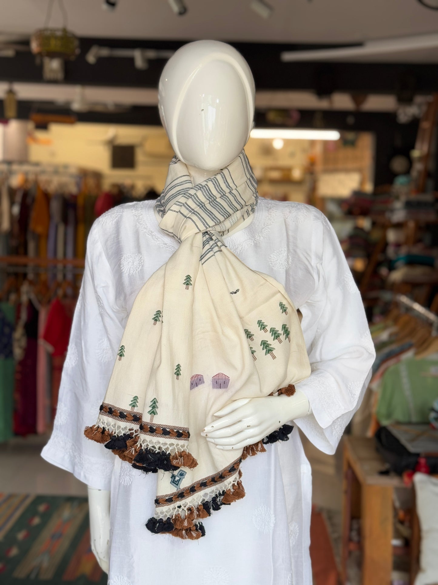 Off white Bhujodi extra weft camel and hut motifs cotton handloom stole
