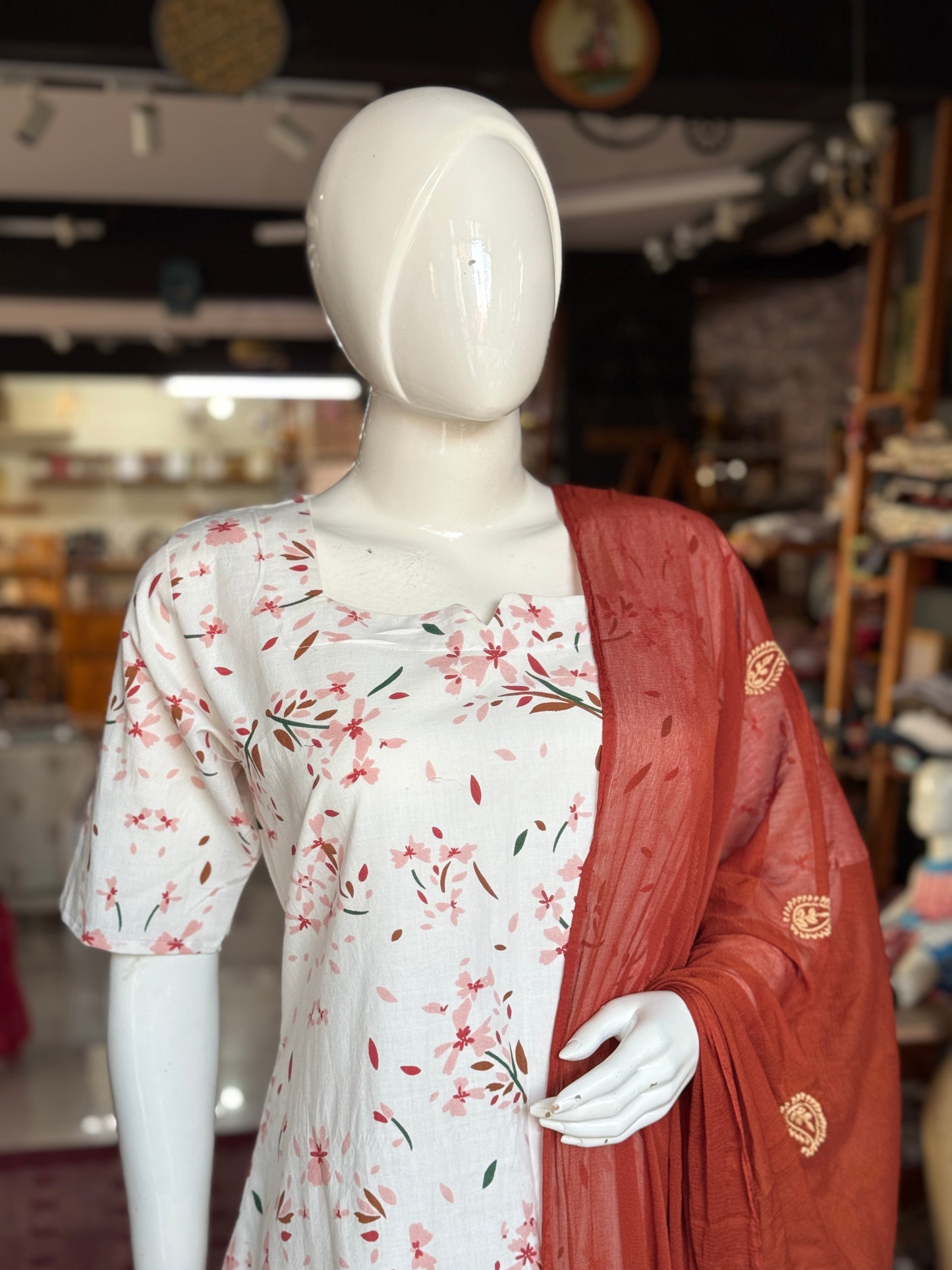 Offwhite handwoven cotton straight cuts kurti with mustard brown and peach flowers print