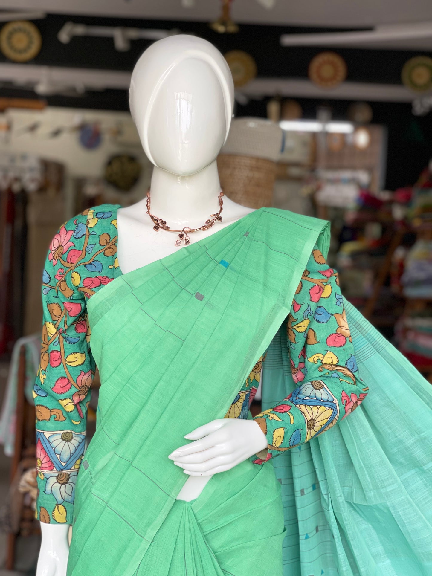 Serene Green and blue hand spun hand woven cotton saree with geometric butis