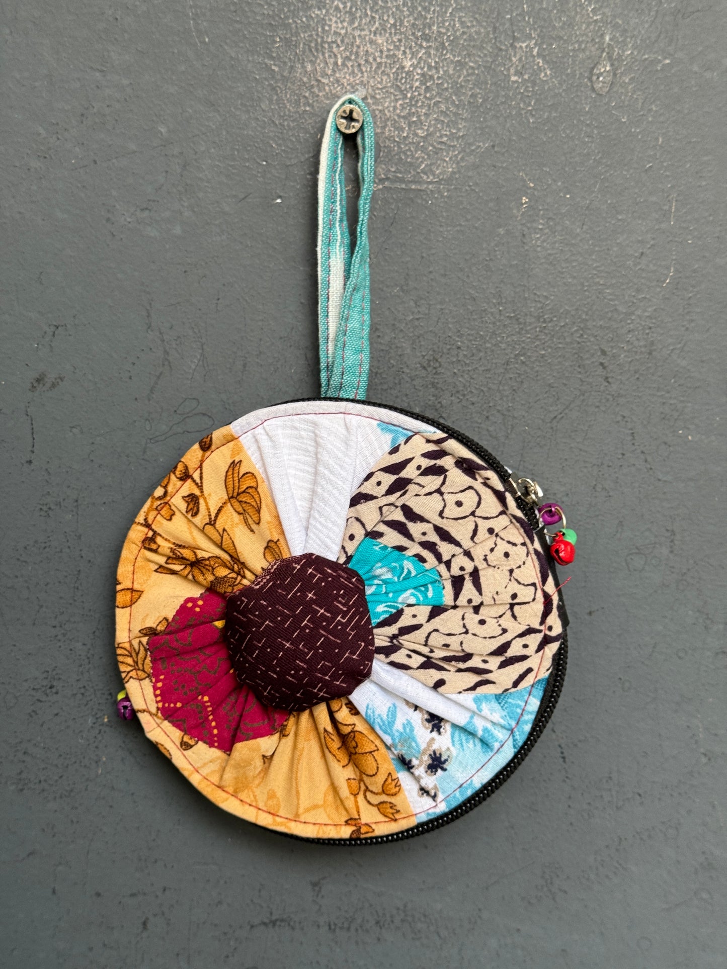 Upcycled handwoven fabric patch work round gifting / coin pouch with zipper closure