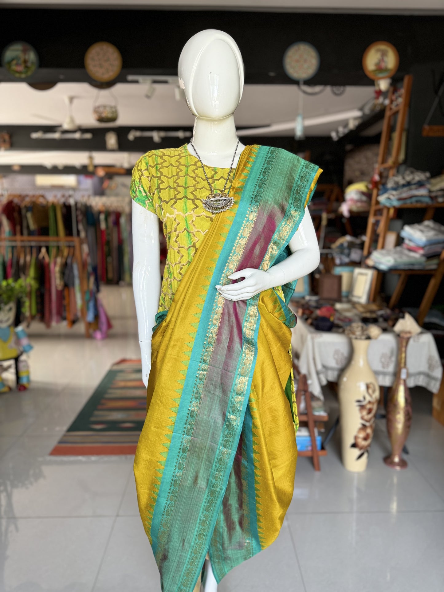 Beautiful mustard and green combination pure silk handwoven Gadwal saree with temple borders