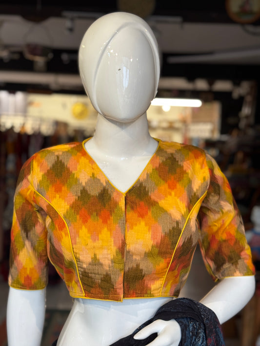 Shades of sun - yellow, orange handloom ikat cotton blouse with piping details and lining