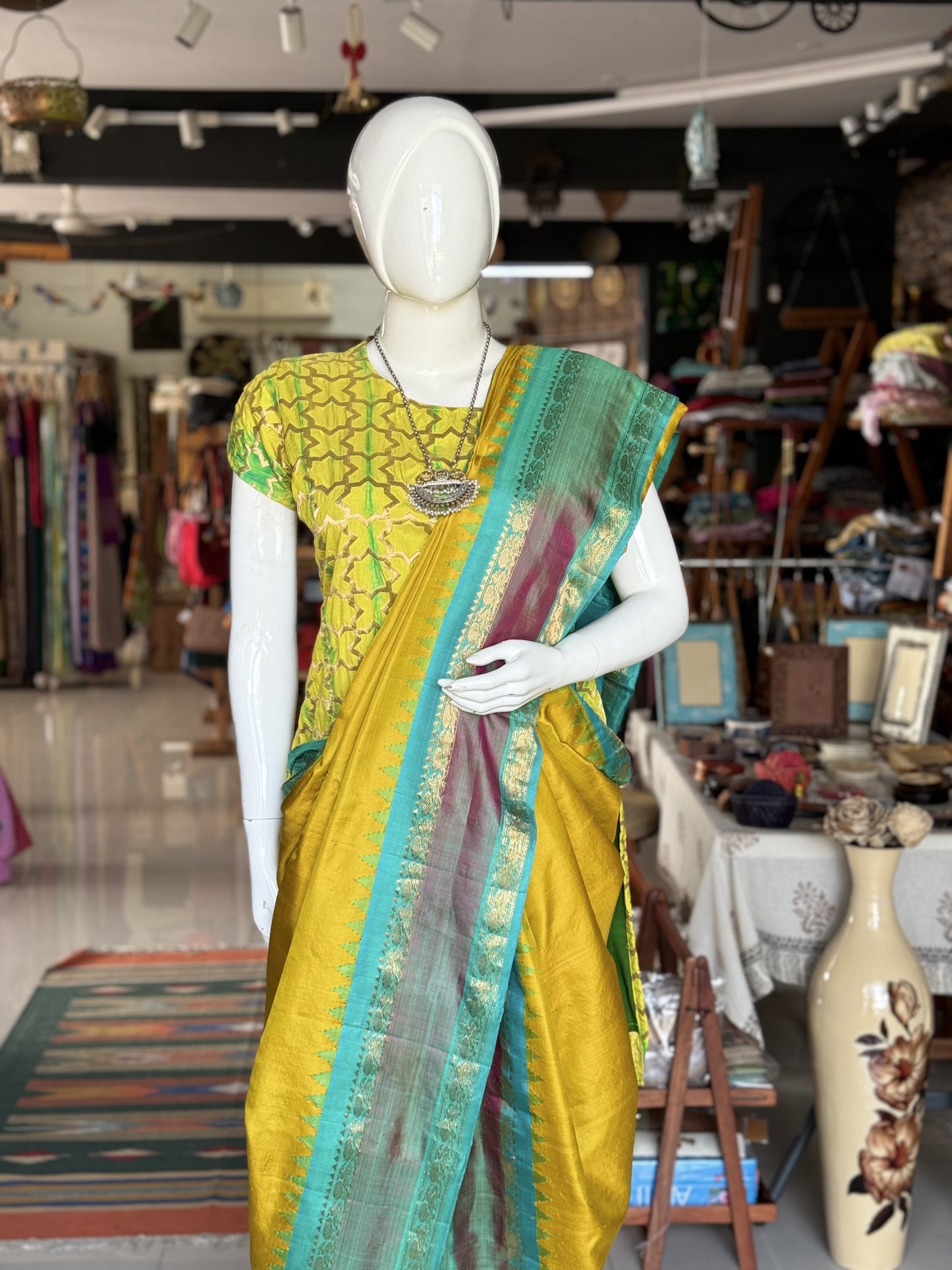 Beautiful mustard and green combination pure silk handwoven Gadwal saree with temple borders