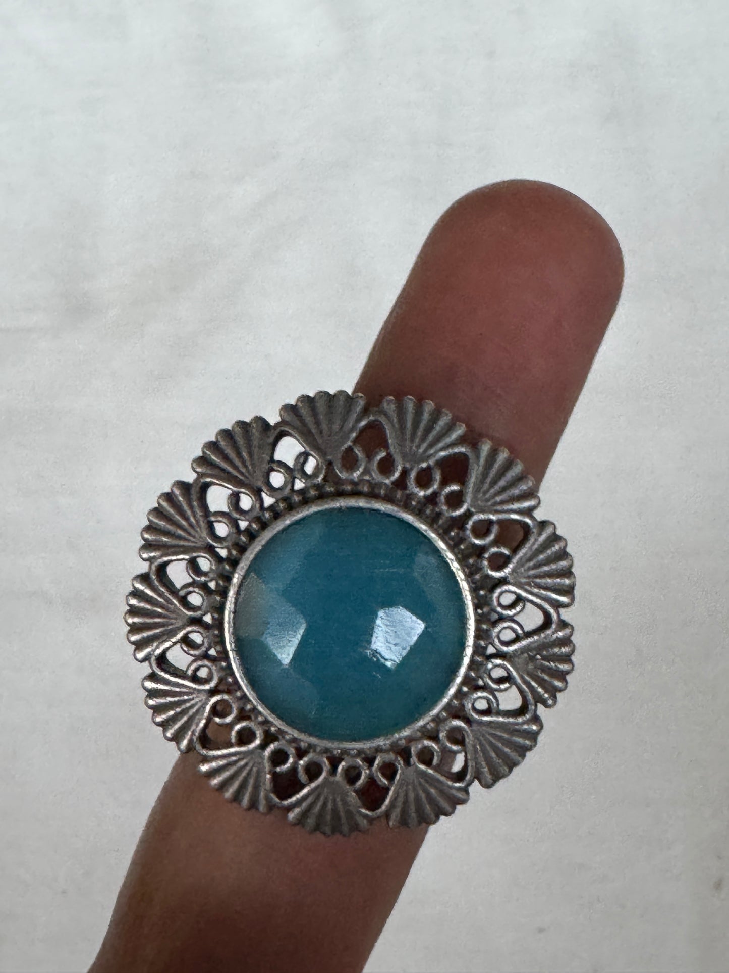 Blue stone center brass finger ring with silver finish