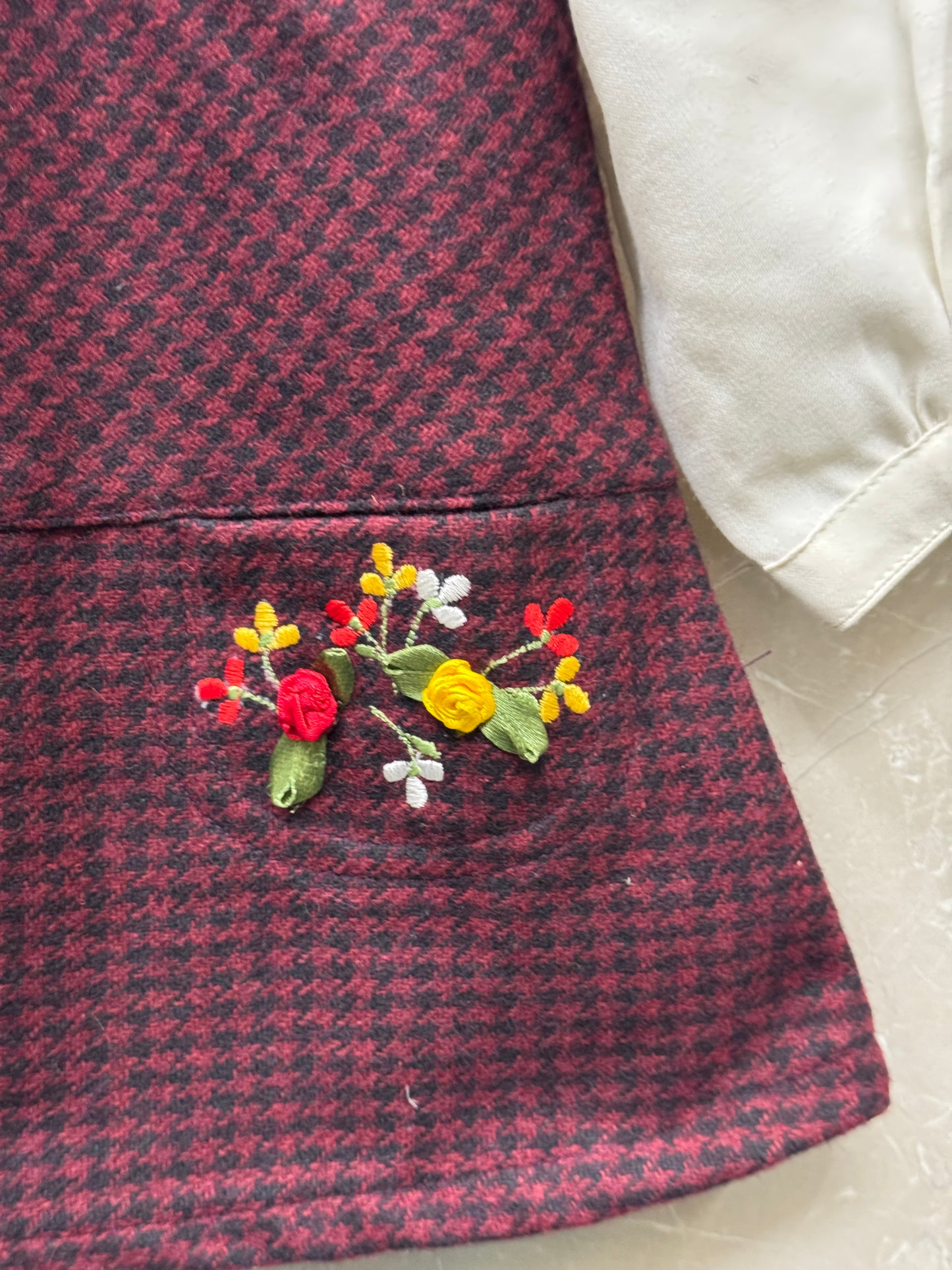 Black burgundy plaid checks hand embroidered frock with Peter Pan collared white inner shirt - for little girls