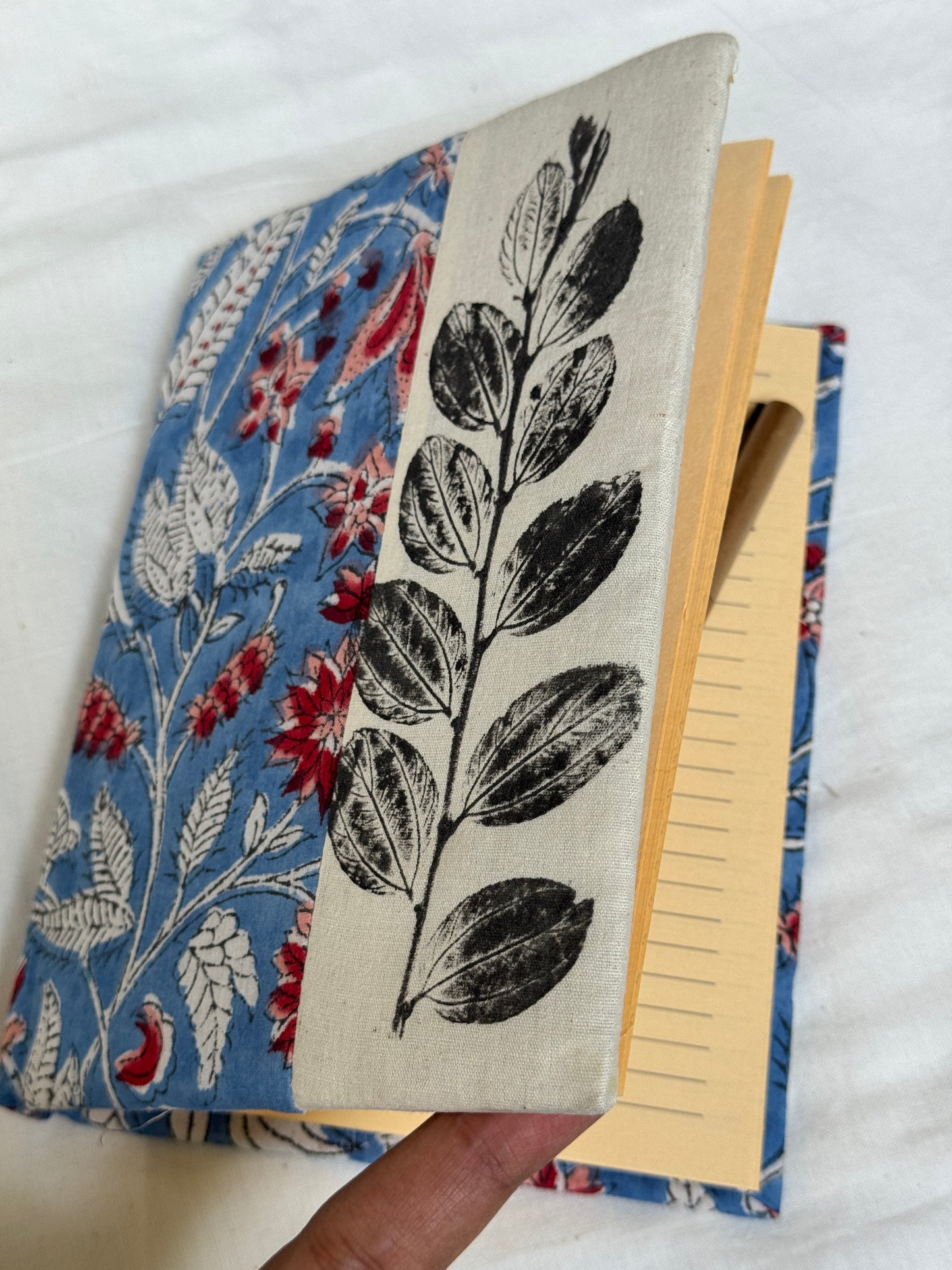 Handmade paper notebooks with hand eco printed fabric cover