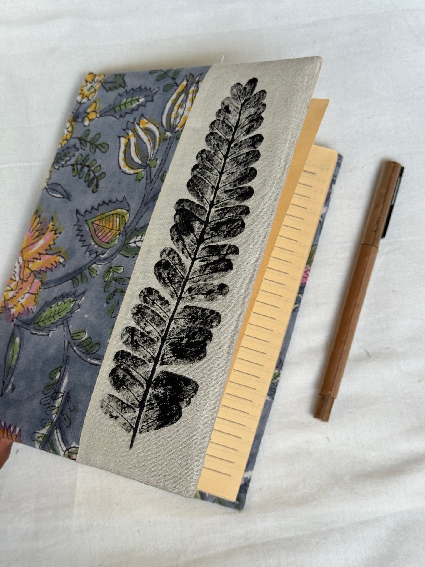 Handmade paper notebooks with hand eco printed fabric cover