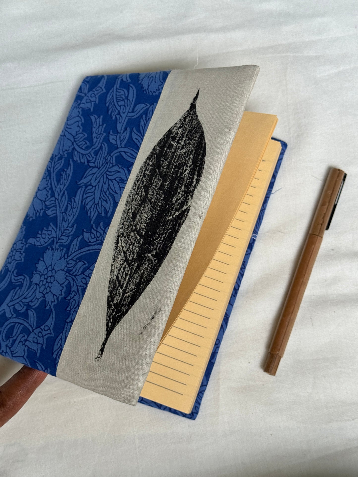 Handmade paper notebooks with hand eco printed fabric cover