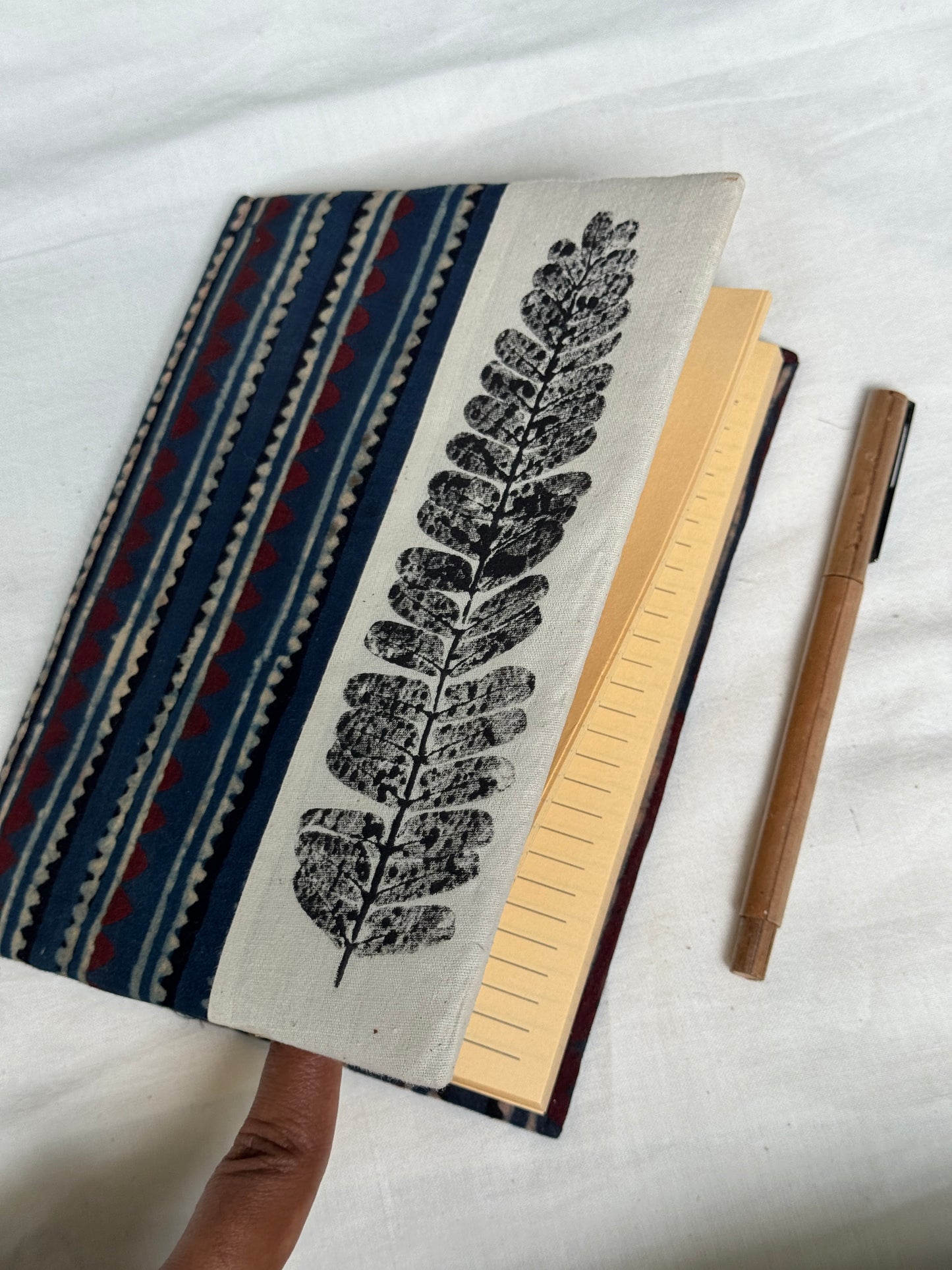 Handmade paper notebooks with hand eco printed fabric cover