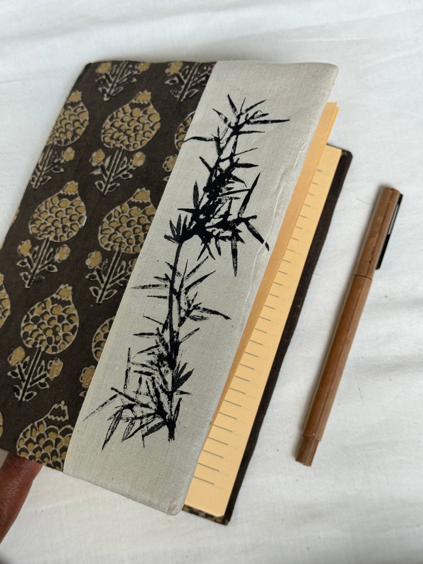 Handmade paper notebooks with hand eco printed fabric cover