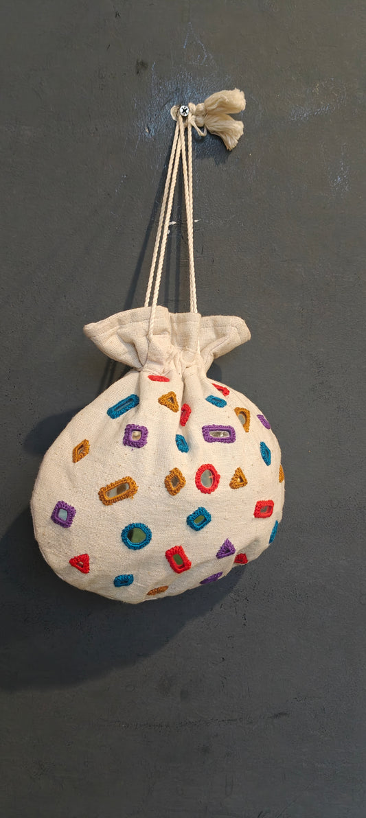 Offwhite cotton potli with mirror work - hand embroidered