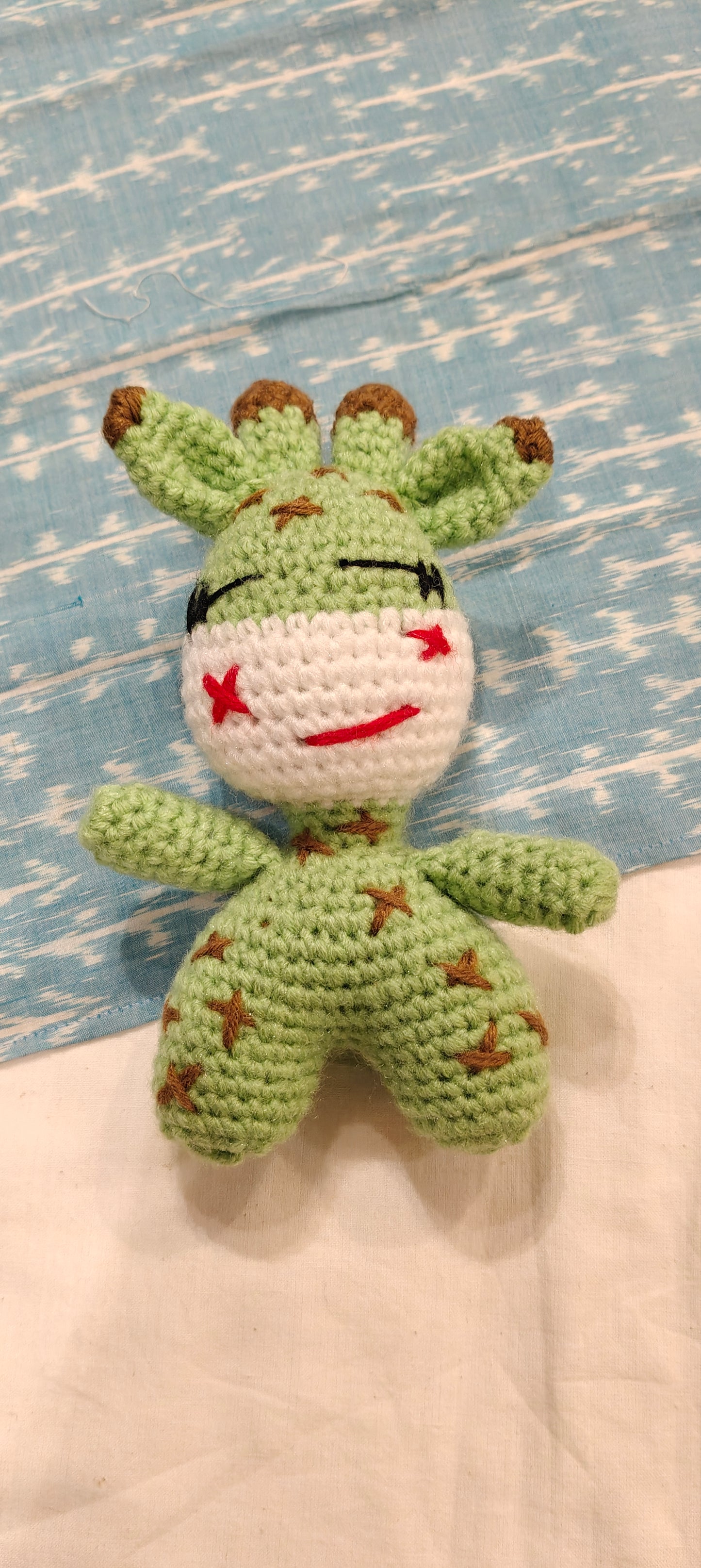 Little green giraffe with brown spots- handcrafted crochet