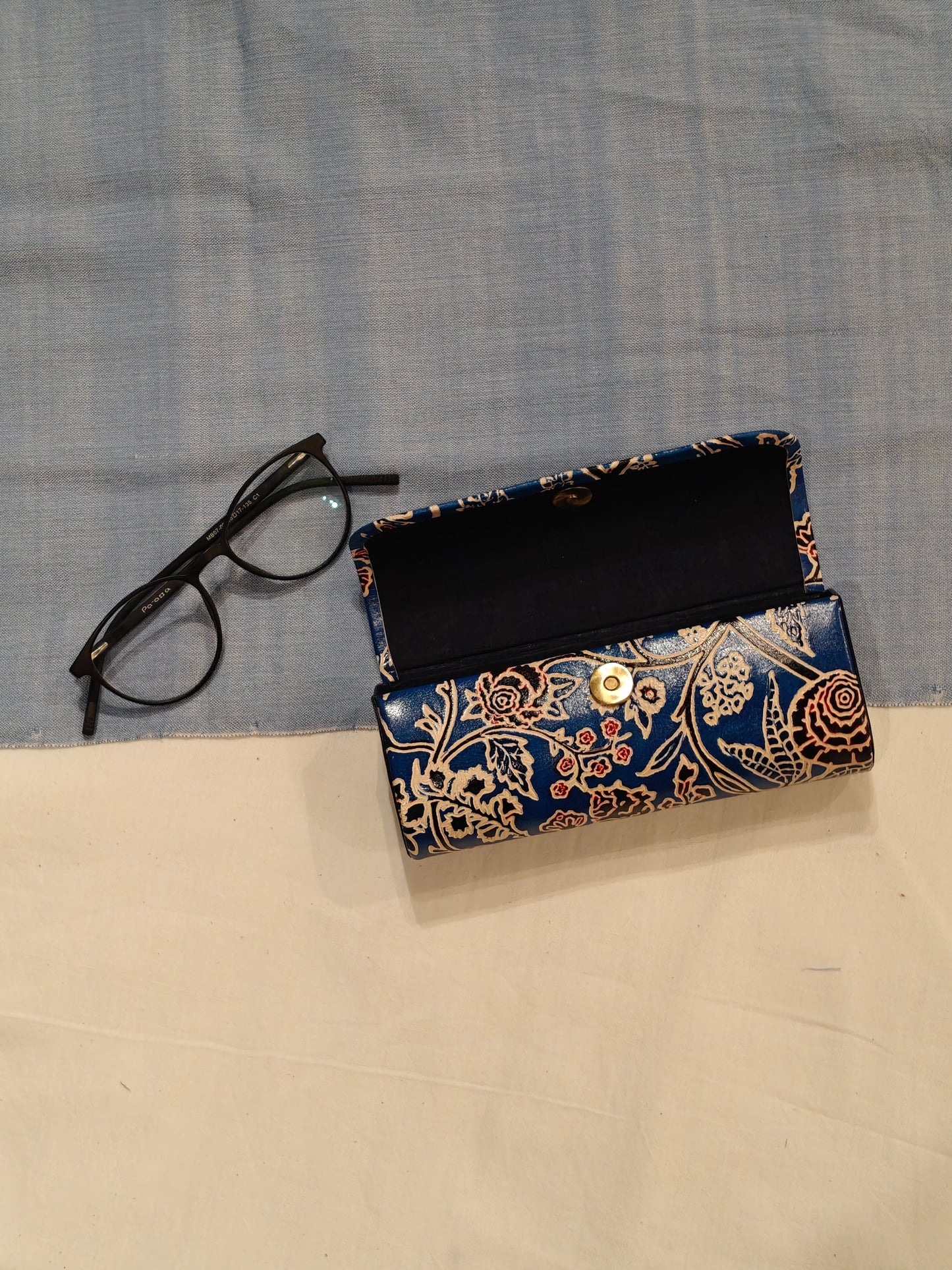 Hand embossed hand painted leather spectacles / goggles case