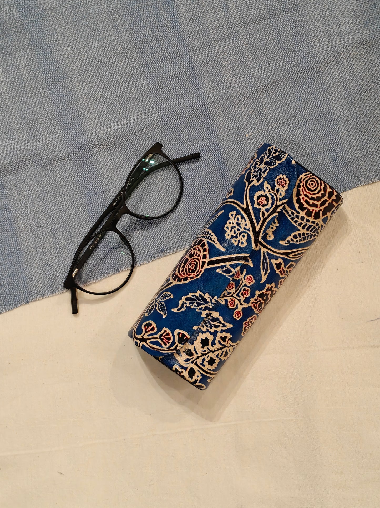 Hand embossed hand painted leather spectacles / goggles case