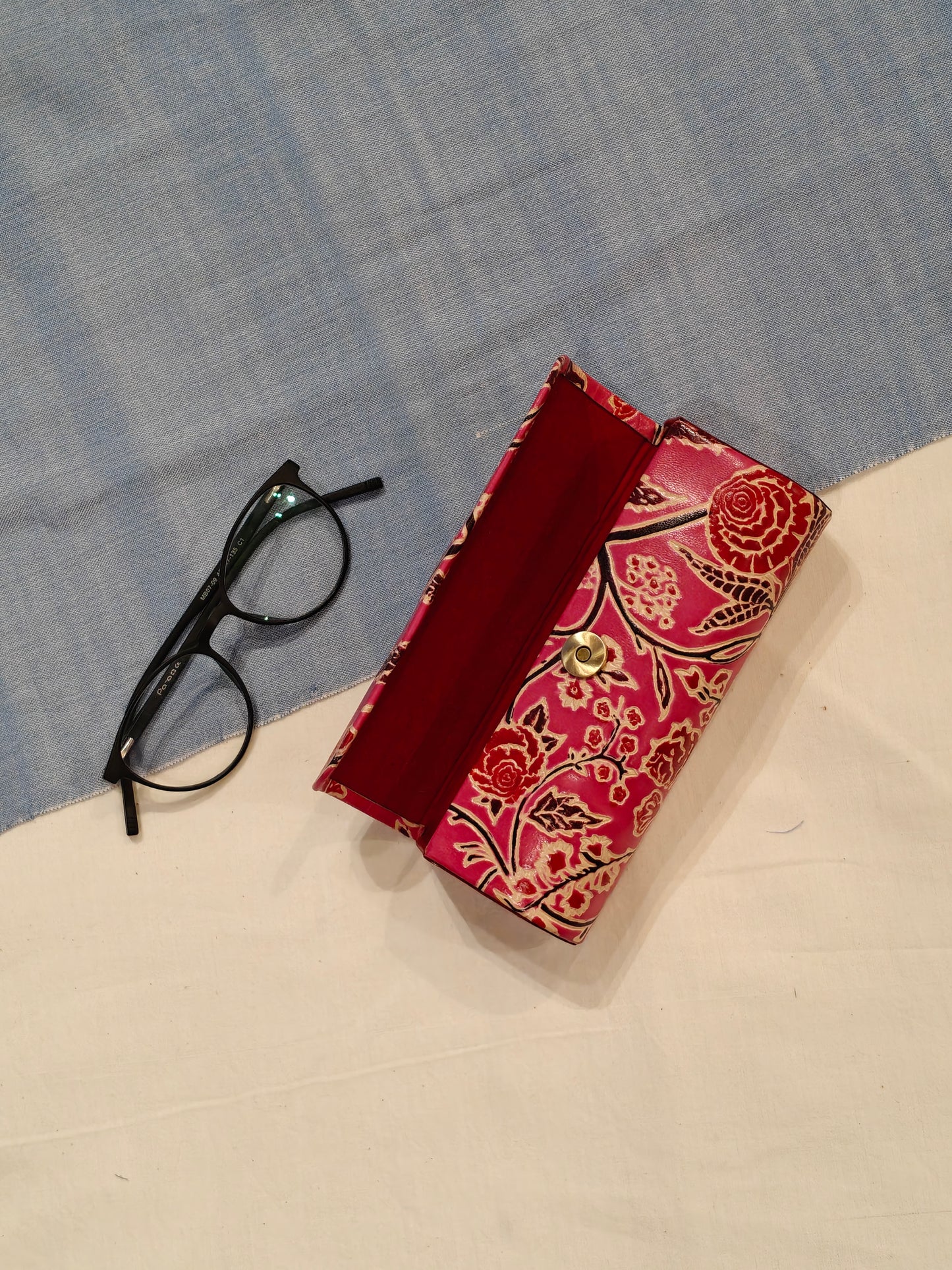 Hand embossed hand painted leather spectacles / goggles case