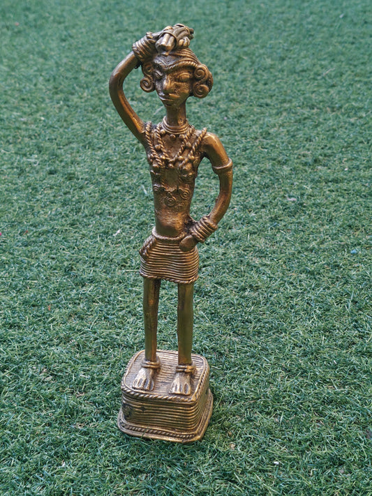 A woman carrying fire wood - Dokra Brass handcrafted decor